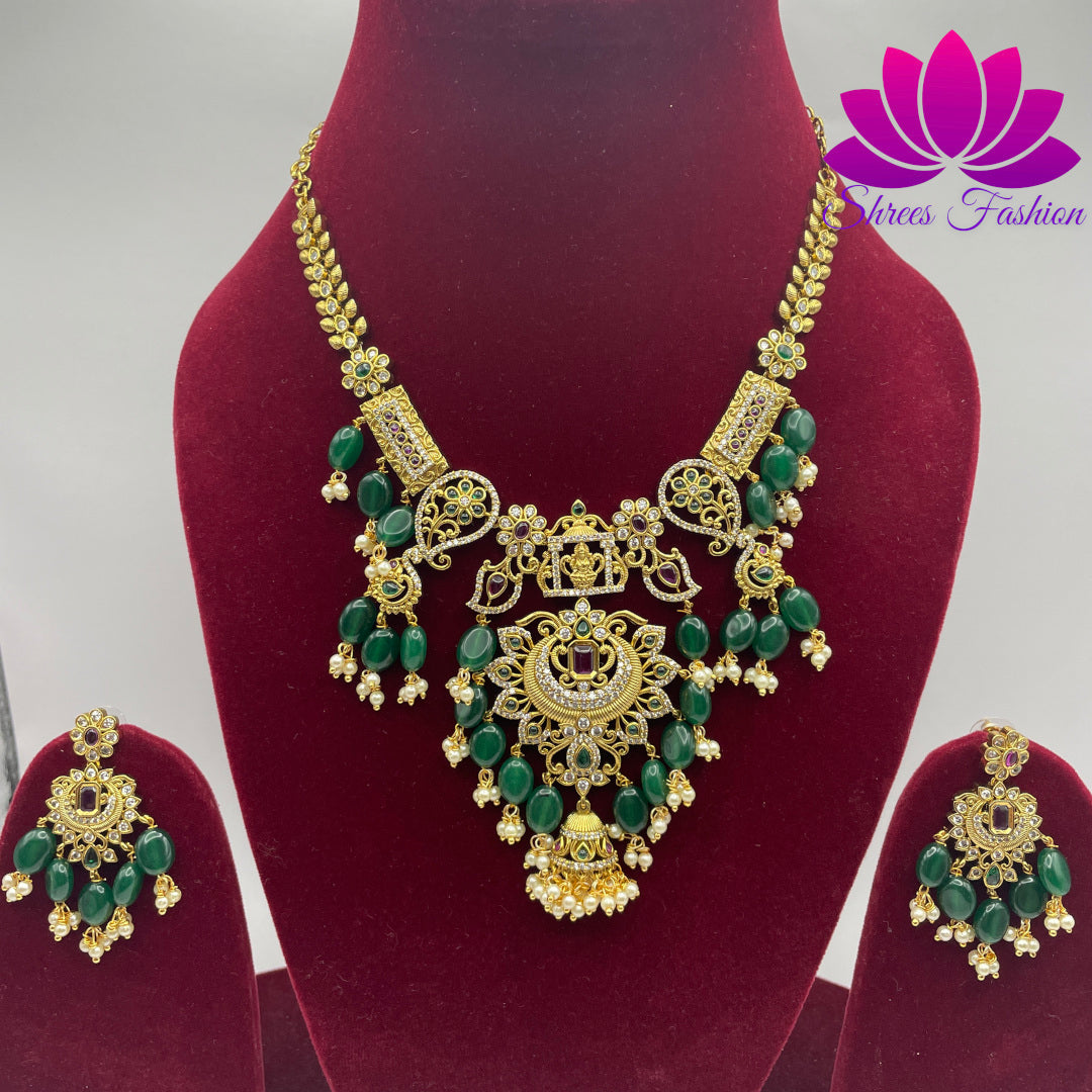 Glamorous Green Elegance: Matte Gold Finish with Cubic Zirconia Stones and Green Beads - Shrees Fashion Australia