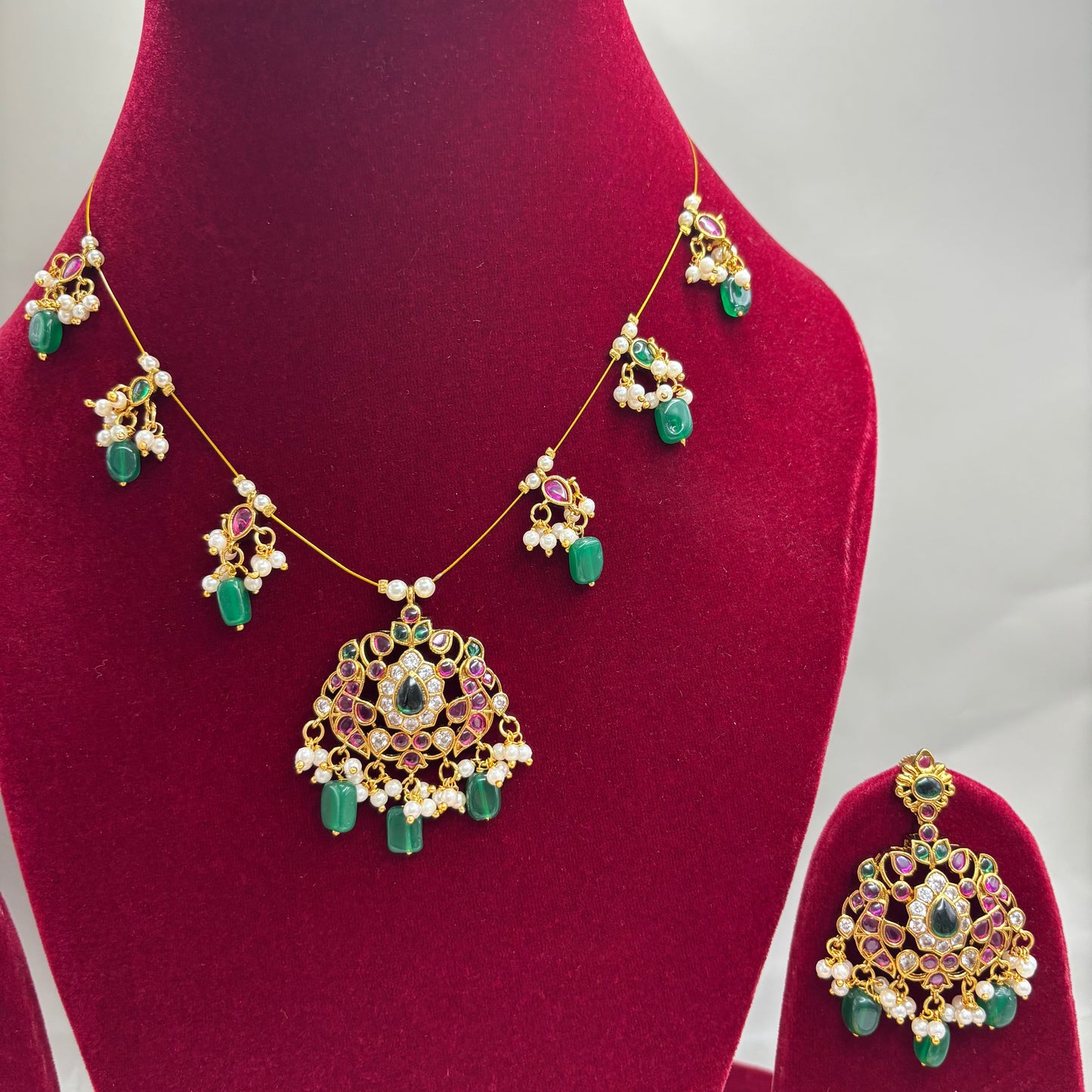 Whispers of Tradition – Invisible Chain Set with Green Motifs & Kemp Stones