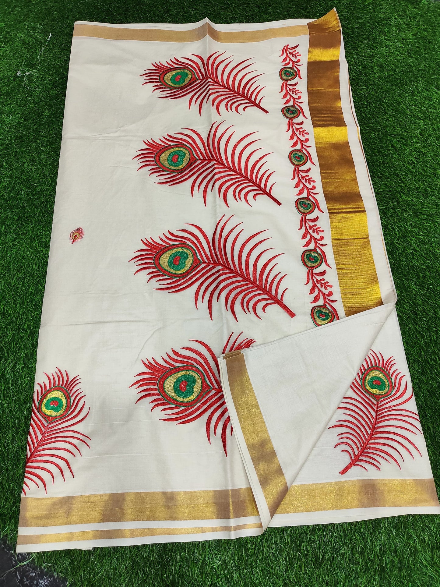 Traditional Kerala Cotton Kasavu Saree with Red–Green Peacock Embroidery