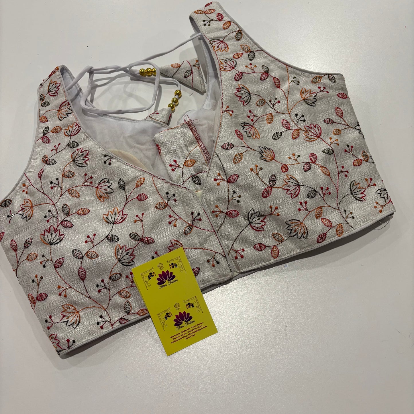White Readymade Blouse with Embroidery Work & Attached Sleeve Fabric