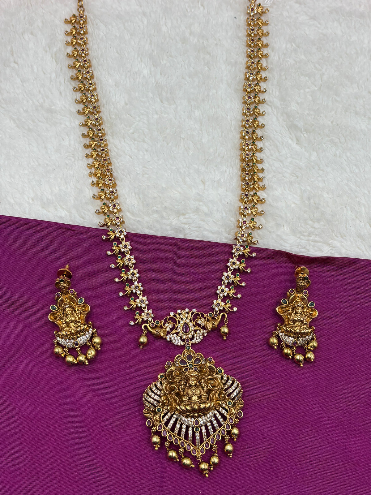 Elegant Temple Long Haram Set with Lakshmi Design & Sparkling White Stones