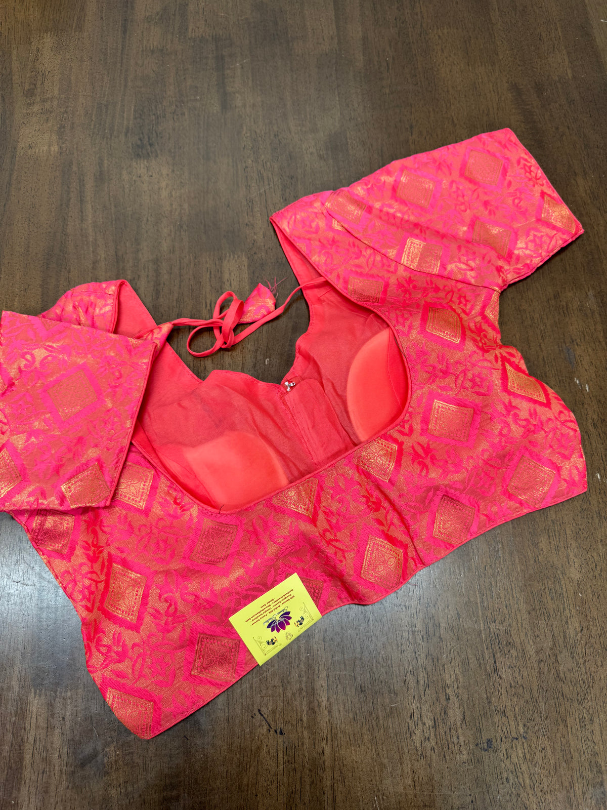 Elegant Pitchy Pink Brocade Blouse Featuring Gold Diamond Motifs