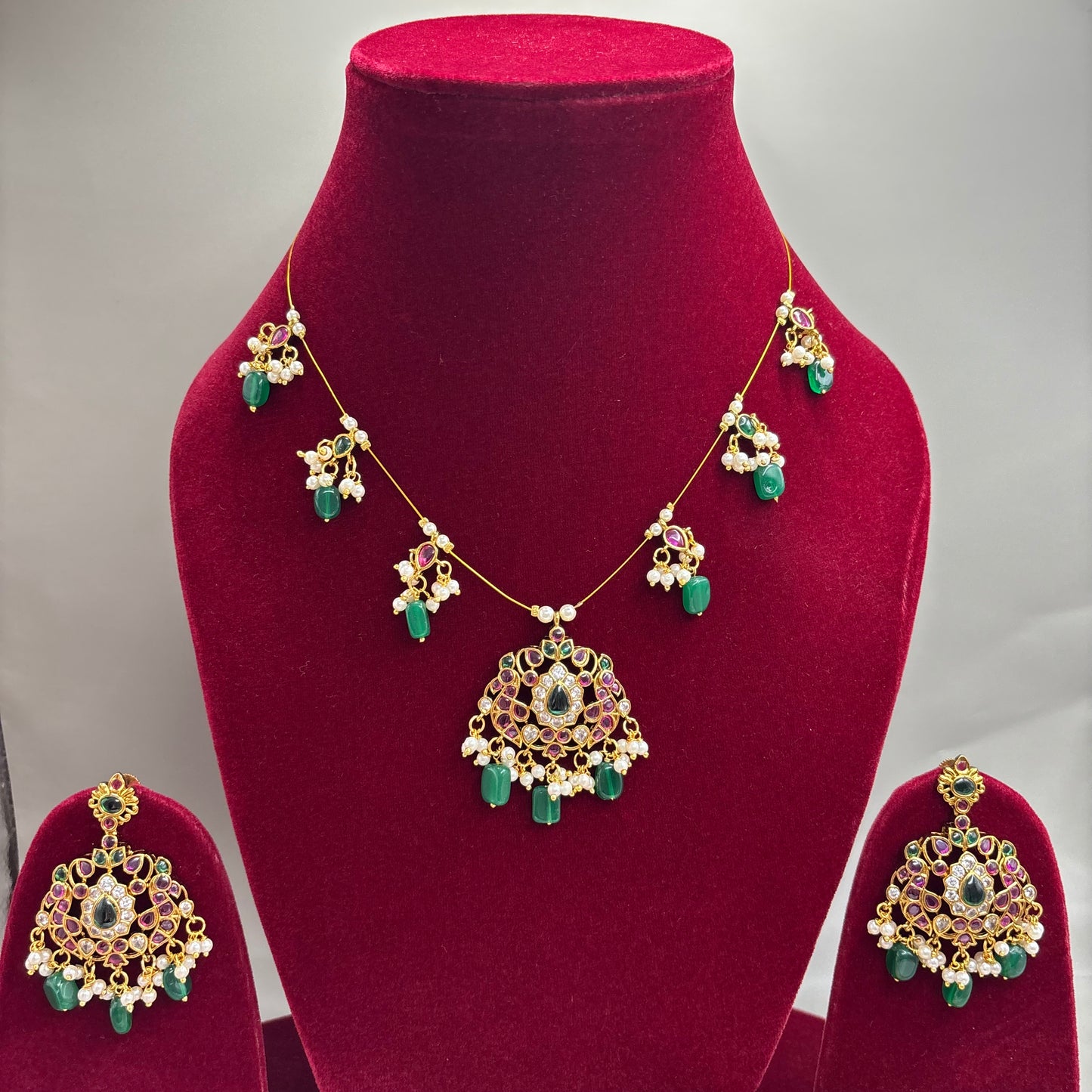 Whispers of Tradition – Invisible Chain Set with Green Motifs & Kemp Stones