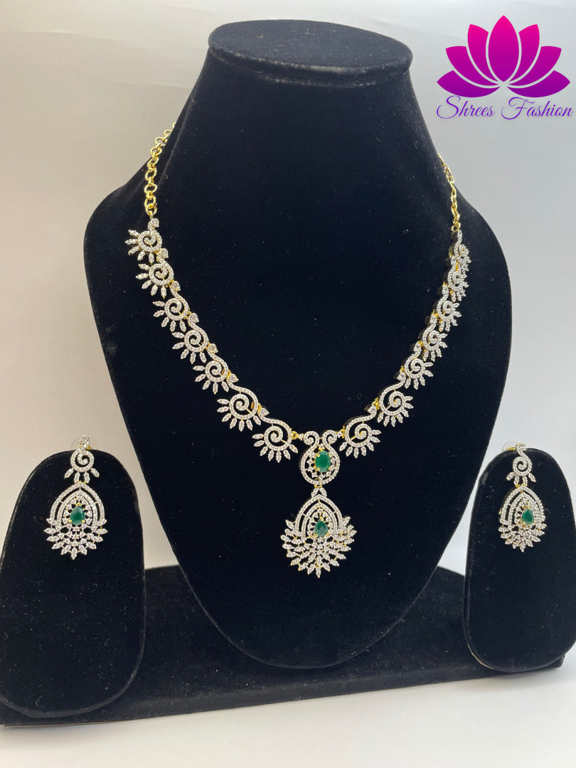 Radiant Elegance Gold-Plated American Diamond Necklace with Central Green Stone | Shrees Fashion