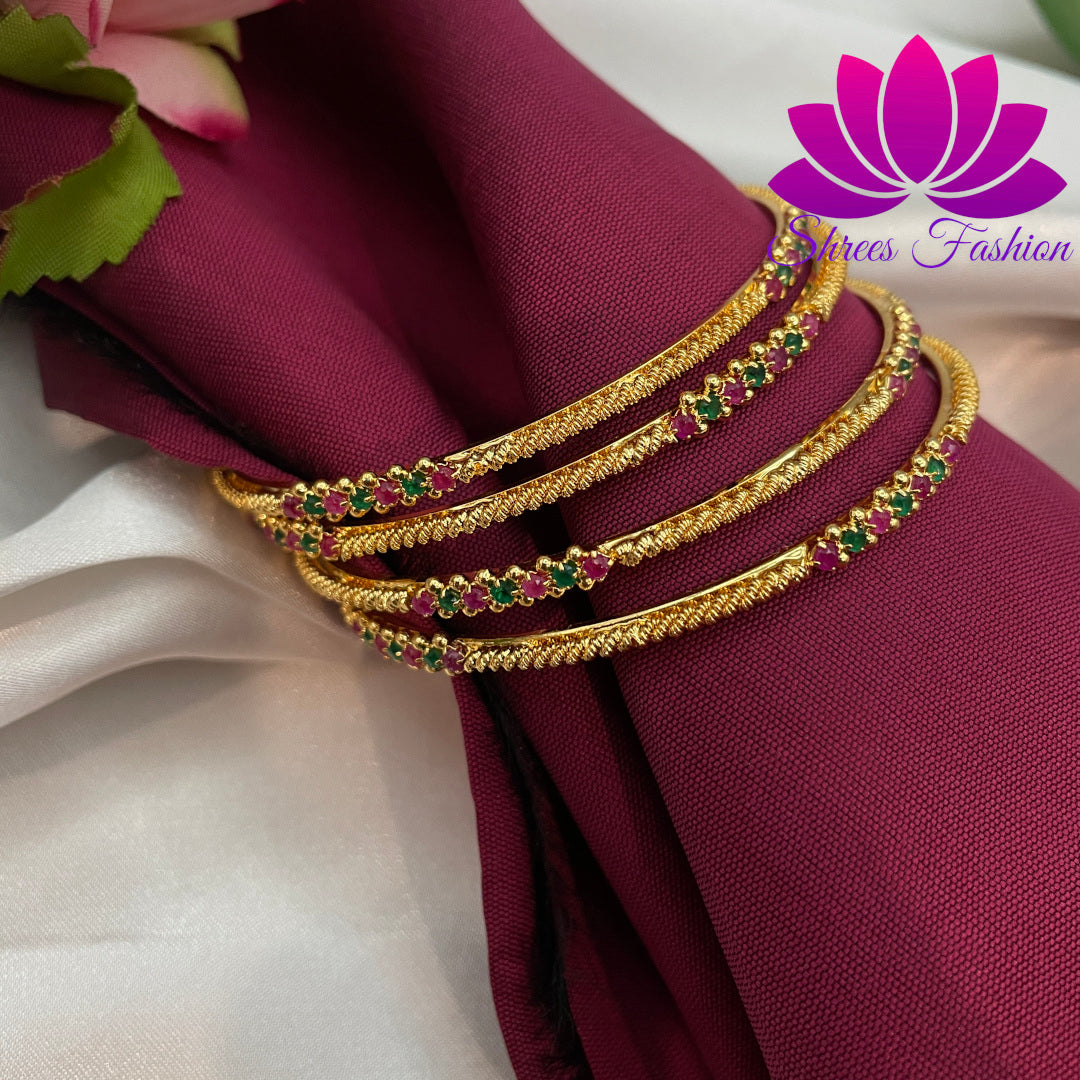 Radiant Simplicity: Shrees Fashion's Gold Finish Set of Four Thin Bangles - Shrees Fashion Australia