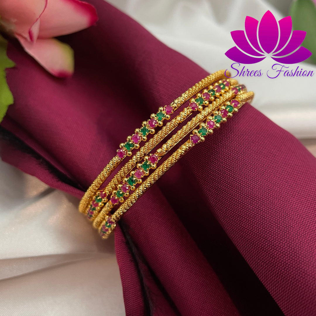 Radiant Simplicity: Shrees Fashion's Gold Finish Set of Four Thin Bangles - Shrees Fashion Australia