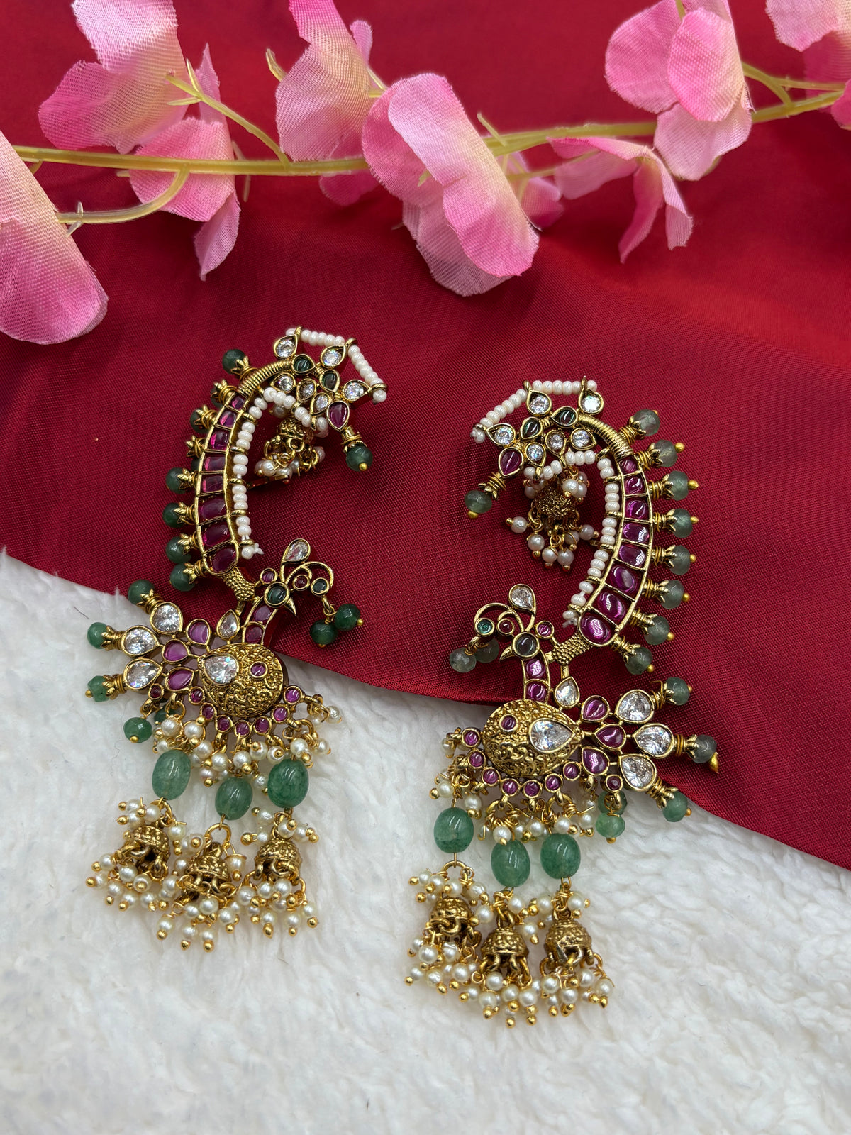 Peacock‑Style Jhumka Earcuff with Ruby, Green Beads & Pearl Drops – Antique Gold Finish