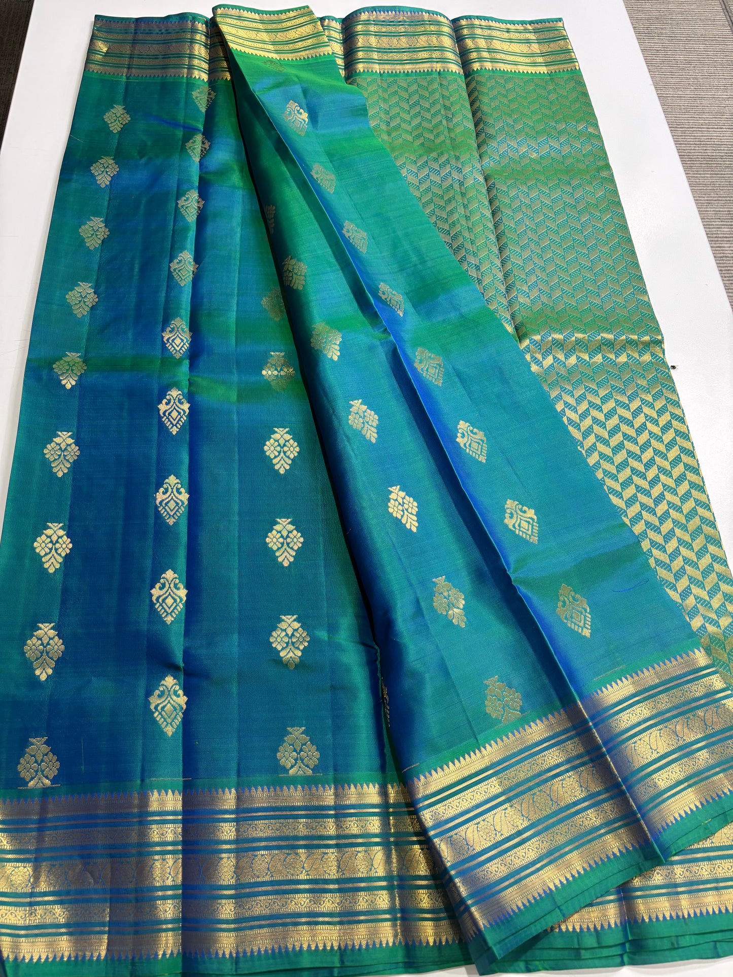 Handwoven Pure Kanchipuram Silk Saree in Regal Peacock Blue with Elegant Classic Accents