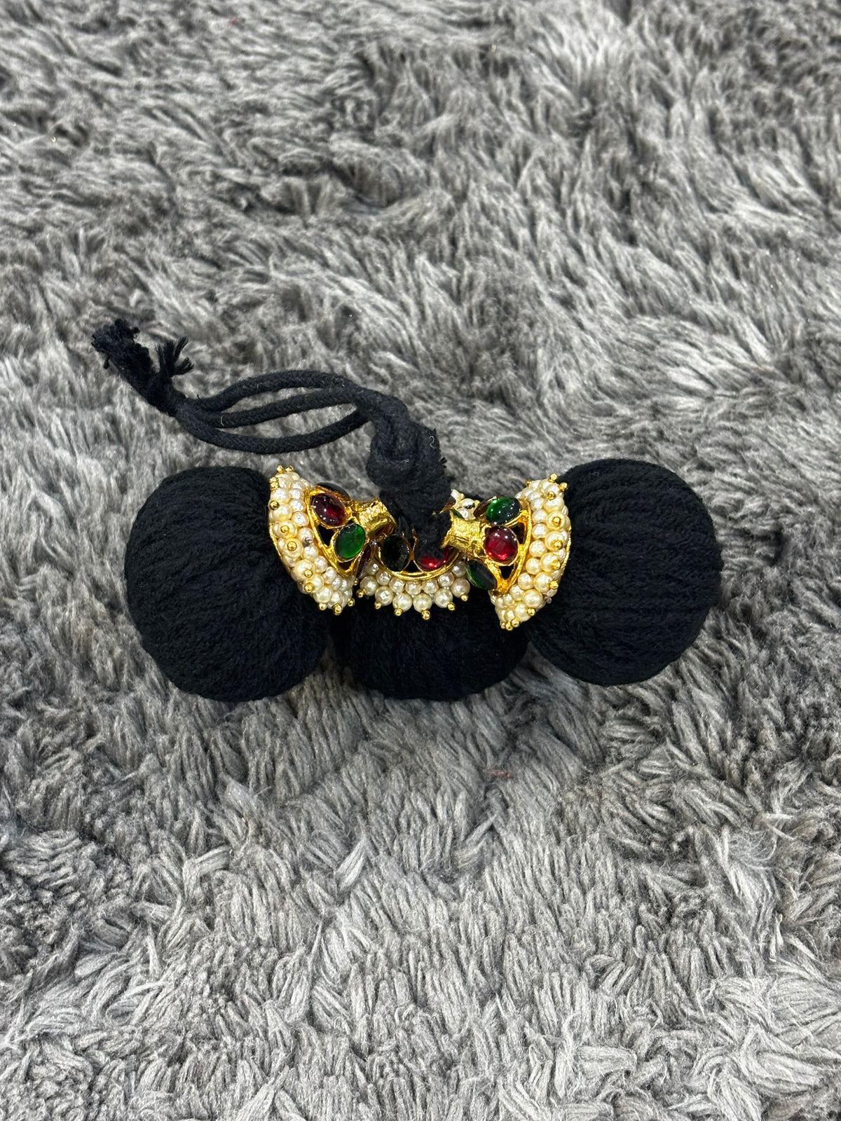 Traditional Kemp Stone Ball Kunjalam for Bharatanatyam braid styling.