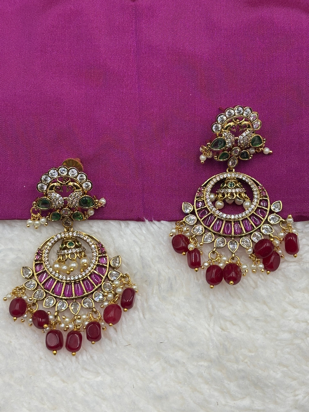 Premium Red Stone Chandbali Jhumka Earrings with Green & Pearl Detailing – Antique Gold Finish