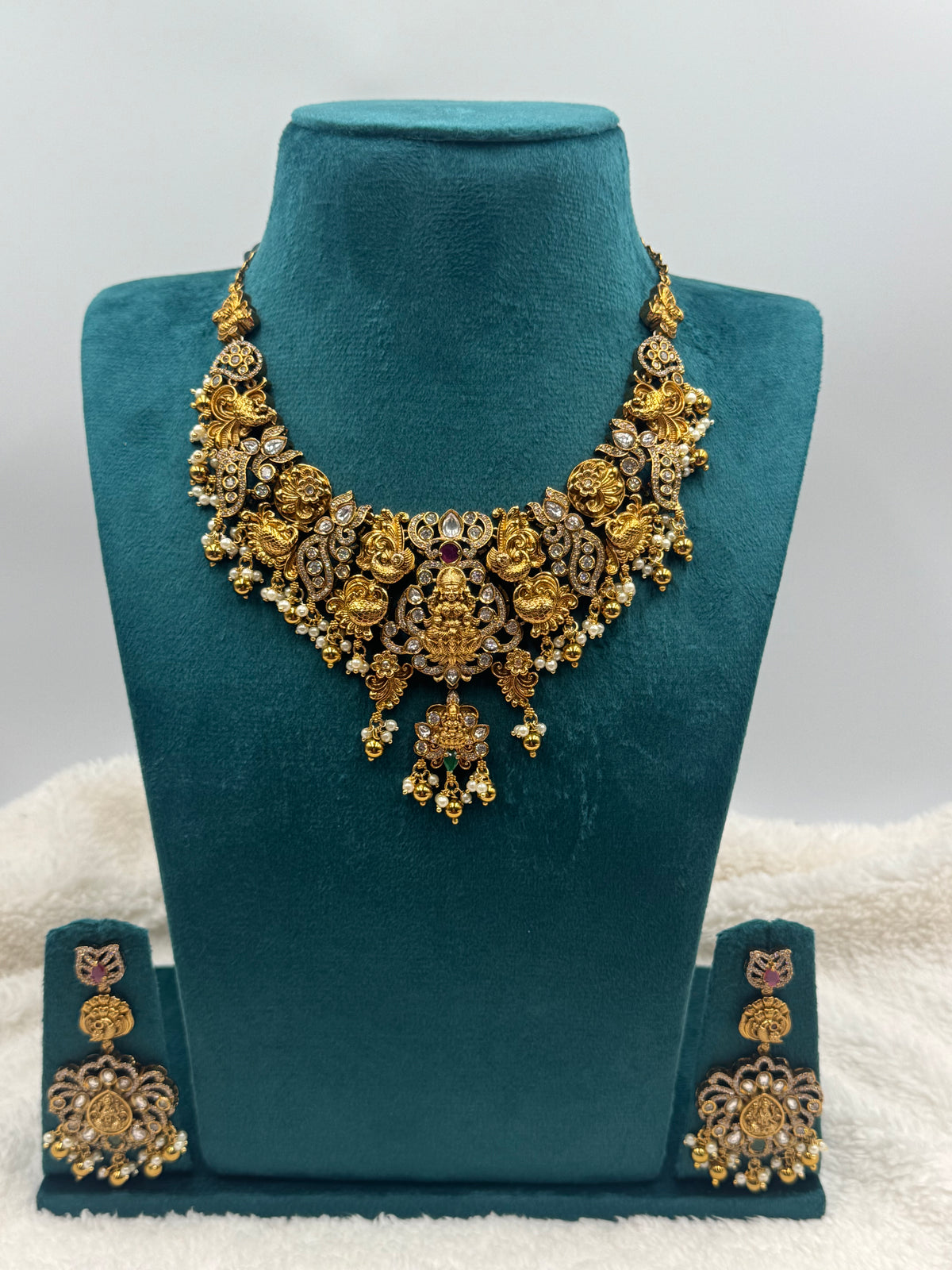 Premium Gold Finish Temple Design Necklace Set with Pearl & Stone Detailing