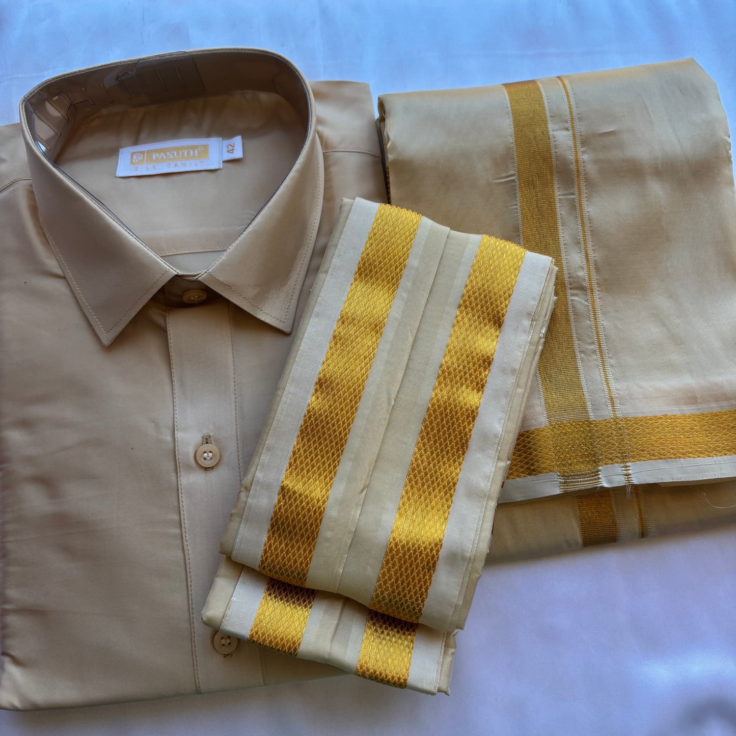 South Indian Gold Silk Veshti Set – Festive Collection