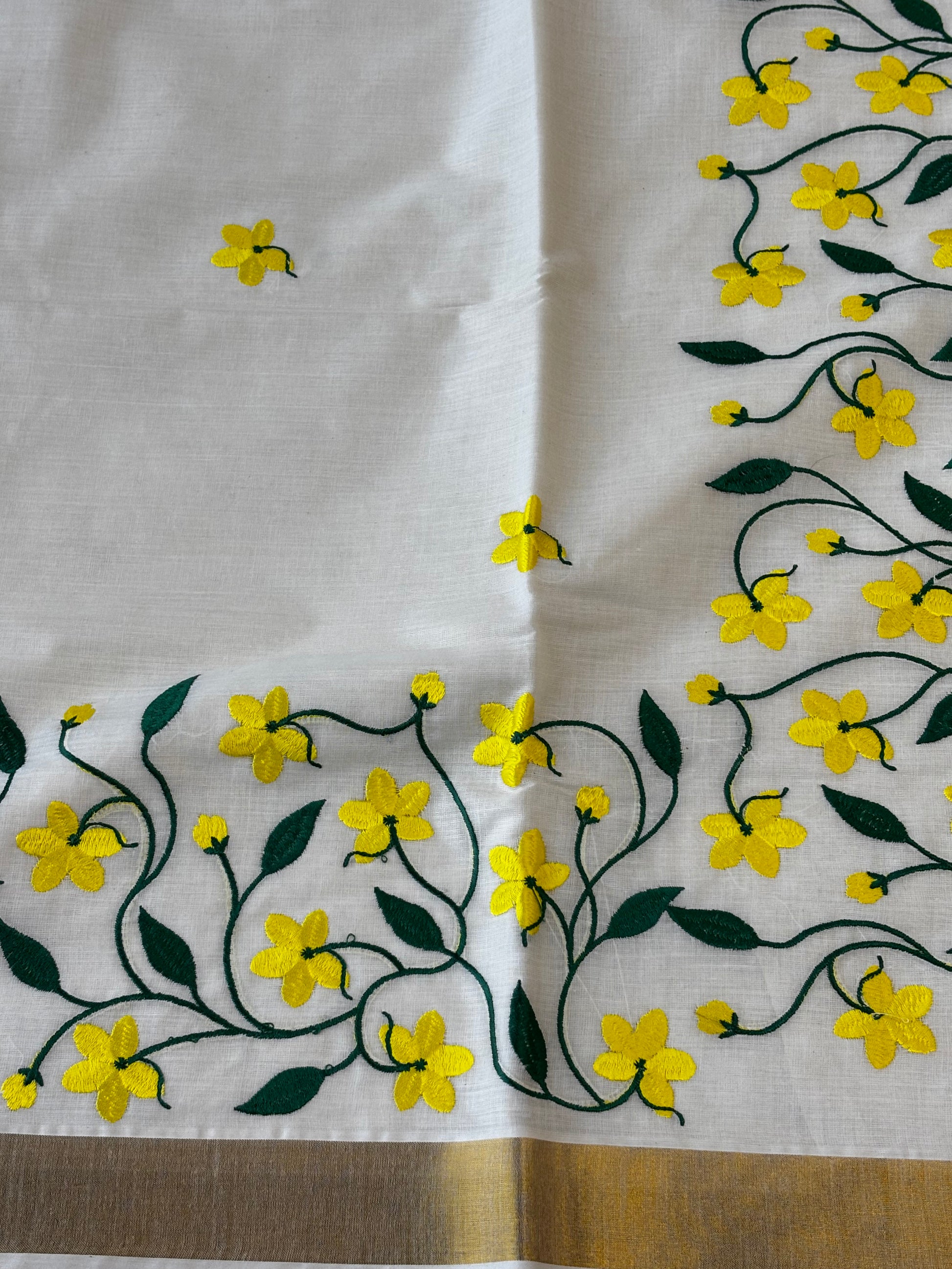 Kerala Kasavu saree with yellow floral and green vine embroidery – view 3