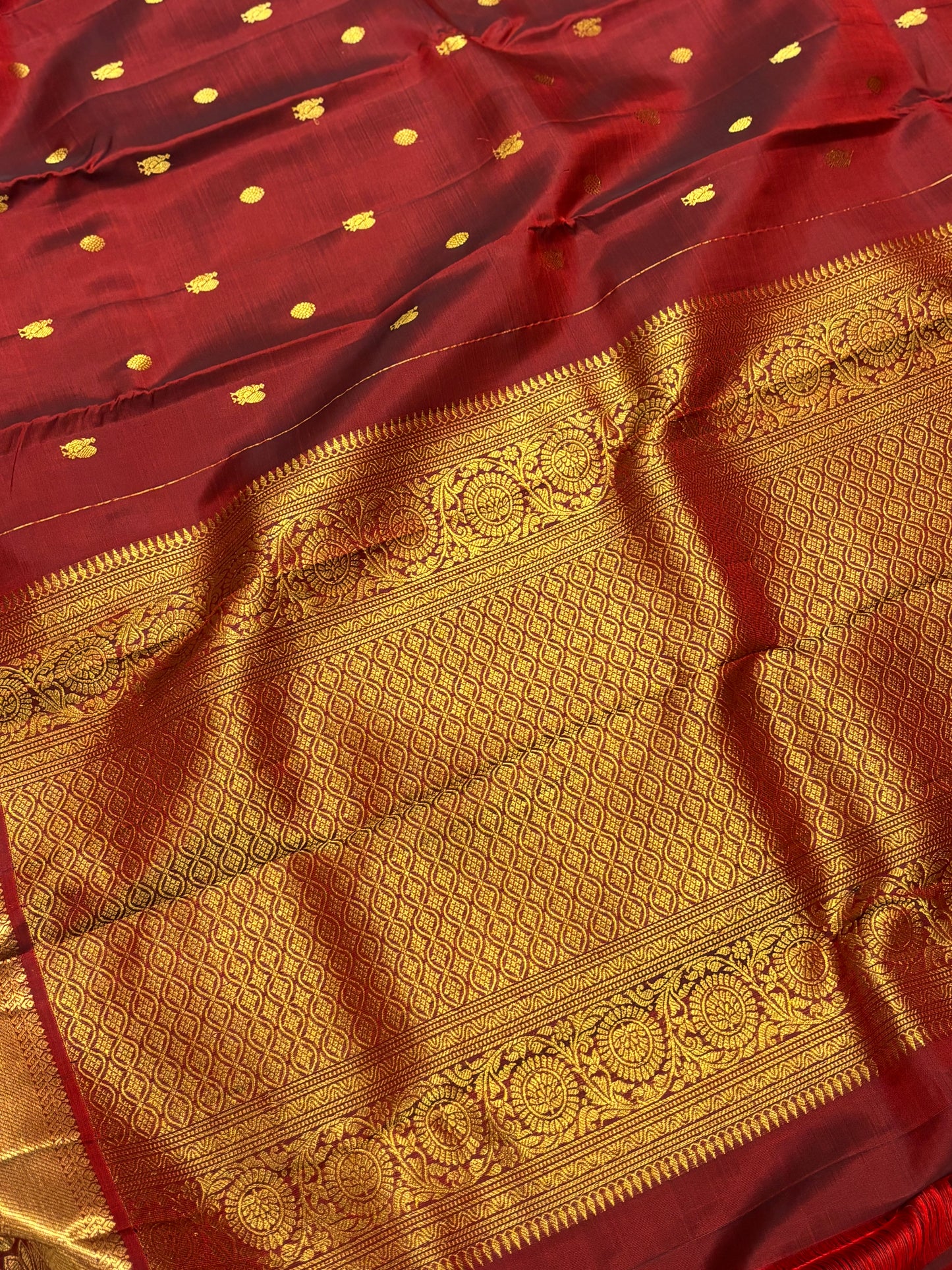 Elegant Maroon Pure Kanchipuram Silk Saree Featuring Traditional Peacock Buttas & Classic Zari Detailing