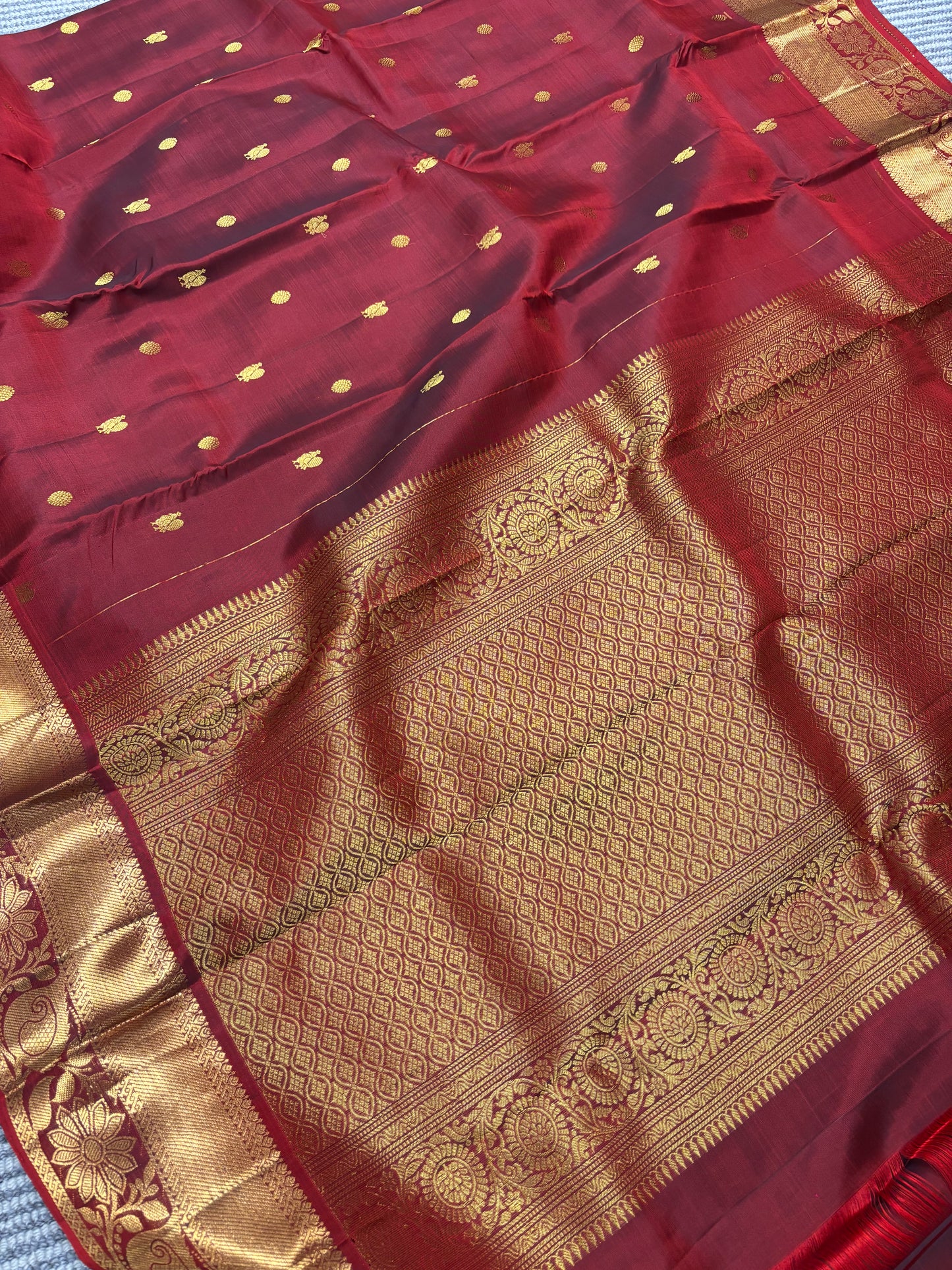 Elegant Maroon Pure Kanchipuram Silk Saree Featuring Traditional Peacock Buttas & Classic Zari Detailing