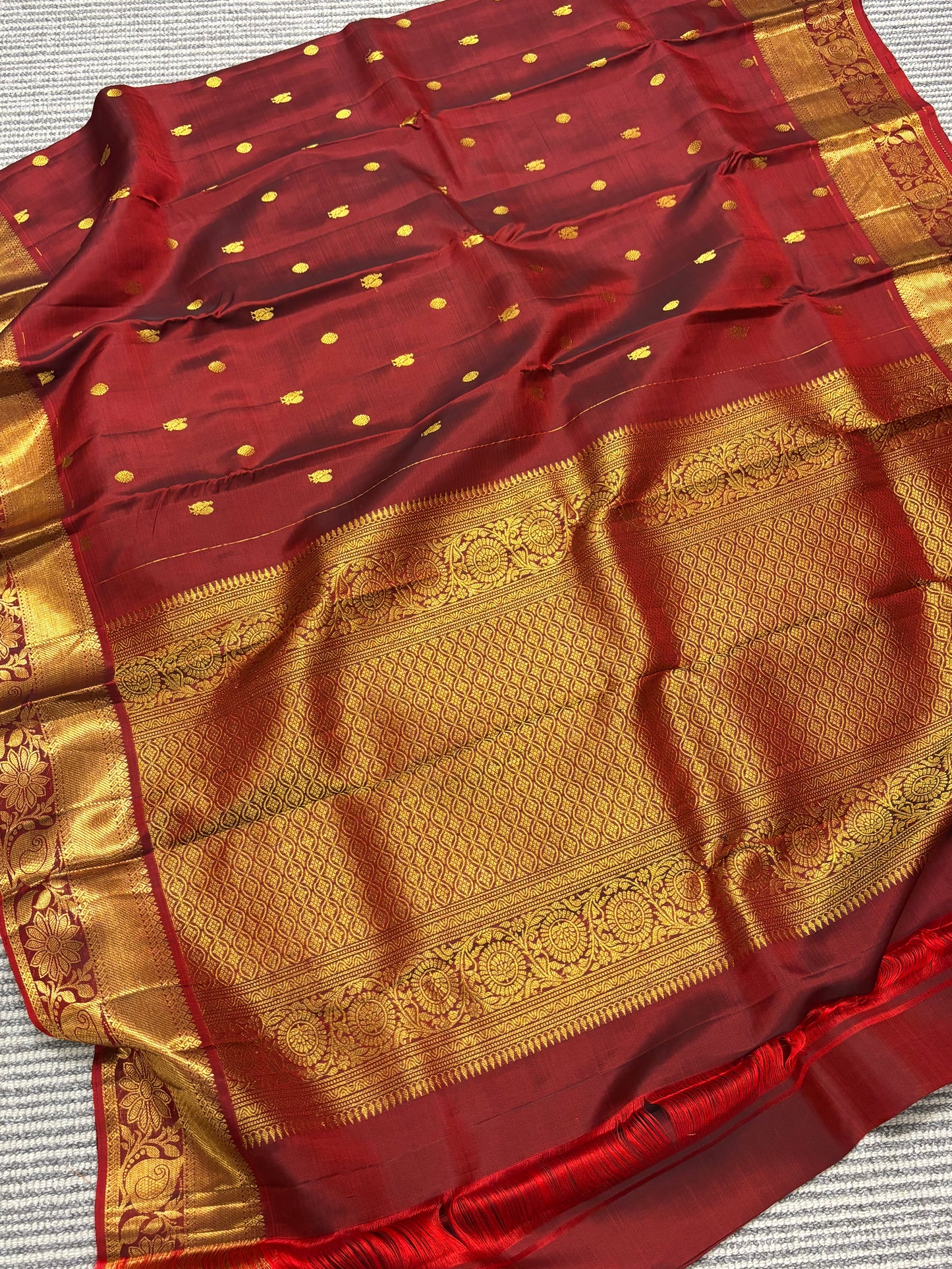 Elegant Maroon Pure Kanchipuram Silk Saree Featuring Traditional Peacock Buttas & Classic Zari Detailing