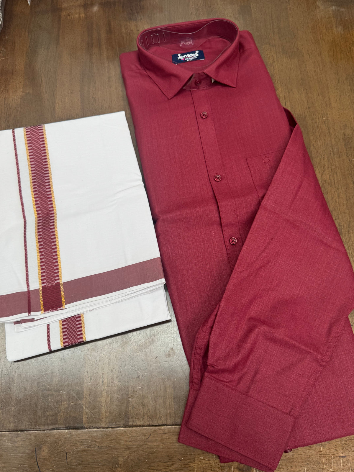 Elegant Magenta Full‑Sleeve Shirt Paired with White Veshti Featuring Gold- Magenta Border