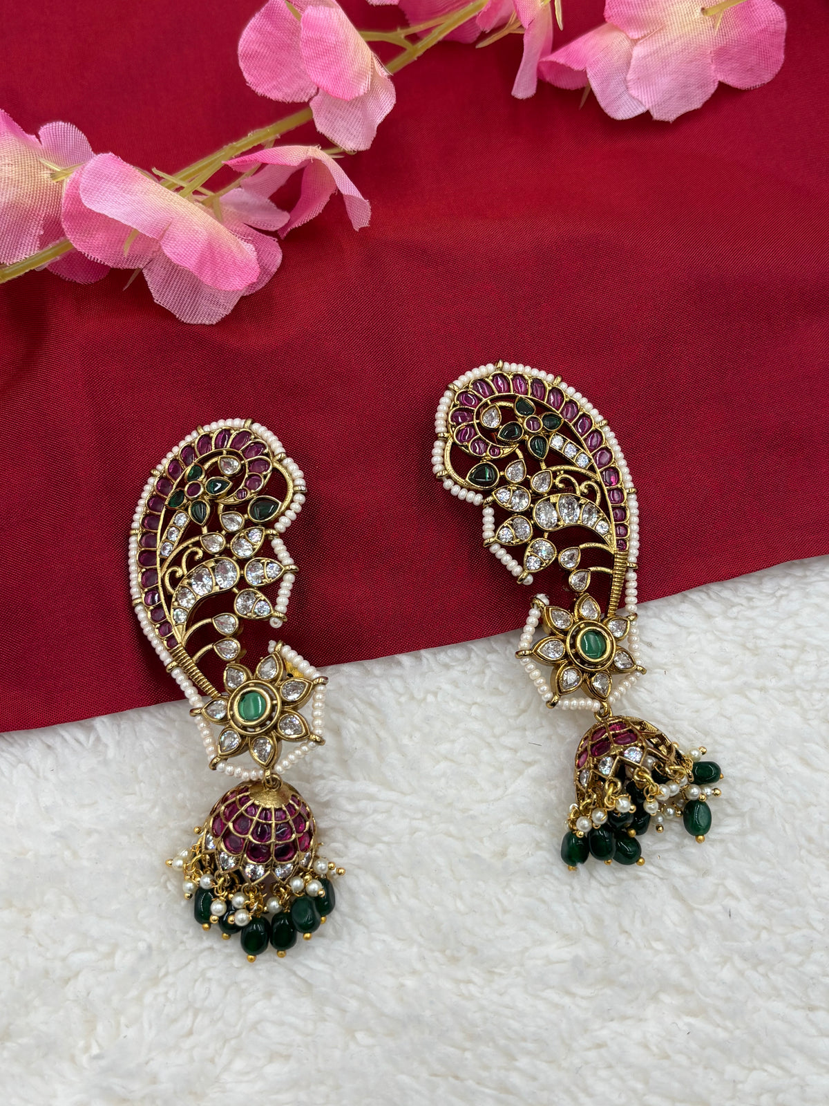 Peacock‑Style Jhumka Earcuff with Ruby, Green Stones & Pearl Detailing – Antique Gold Finish