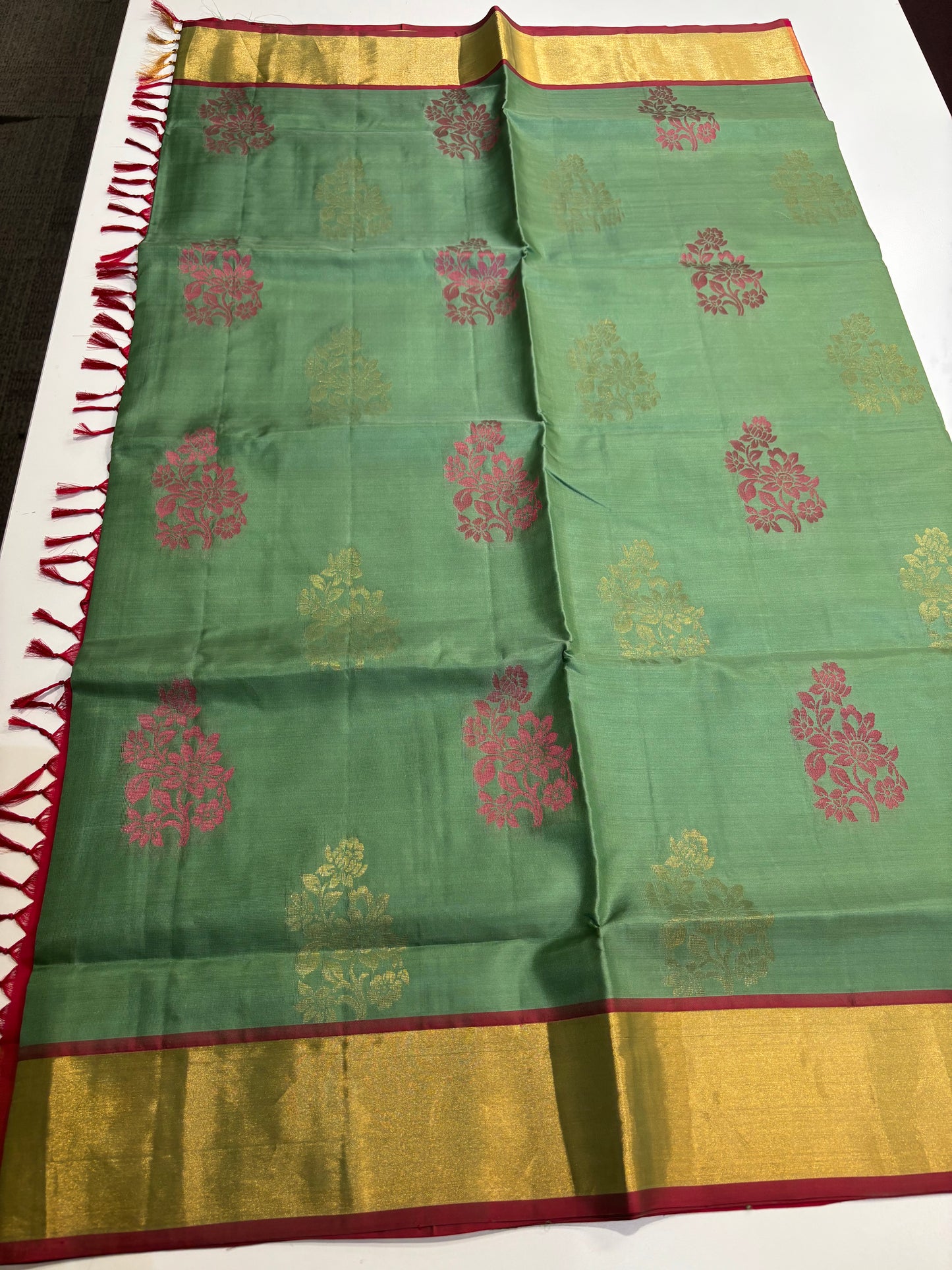 Pure Kanchipuram Silk Saree – Leaf Green Body with Crimson Red Zari Pallu & Traditional Border