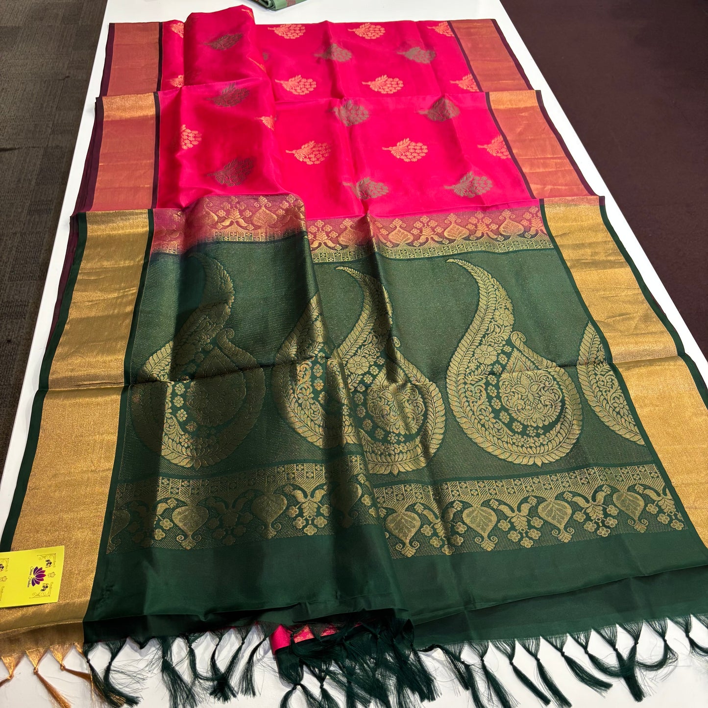 Handwoven Kanchipuram Silk Saree in Rani Pink and Bottle Green with Gold Zari Work