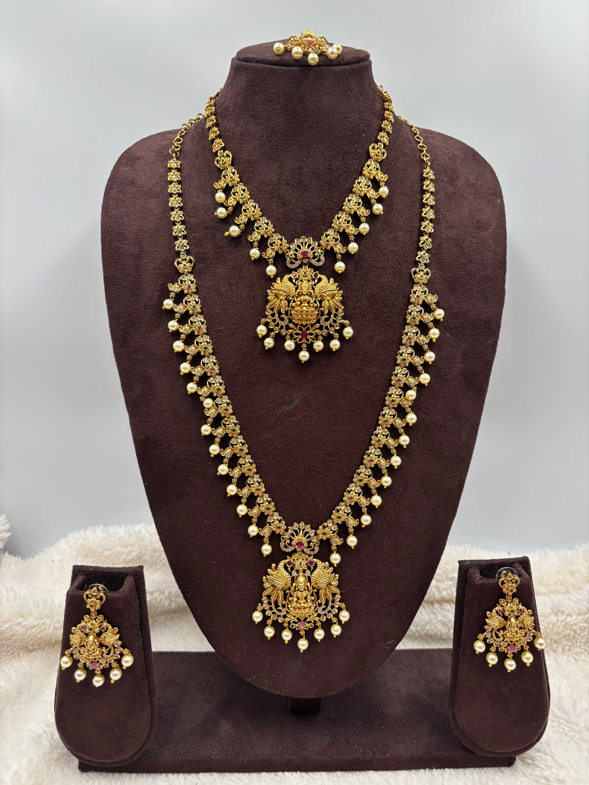Semi‑Bridal Temple Jewellery Set with Lakshmi Design, Pink Stones & Pearls – Antique Gold Finish