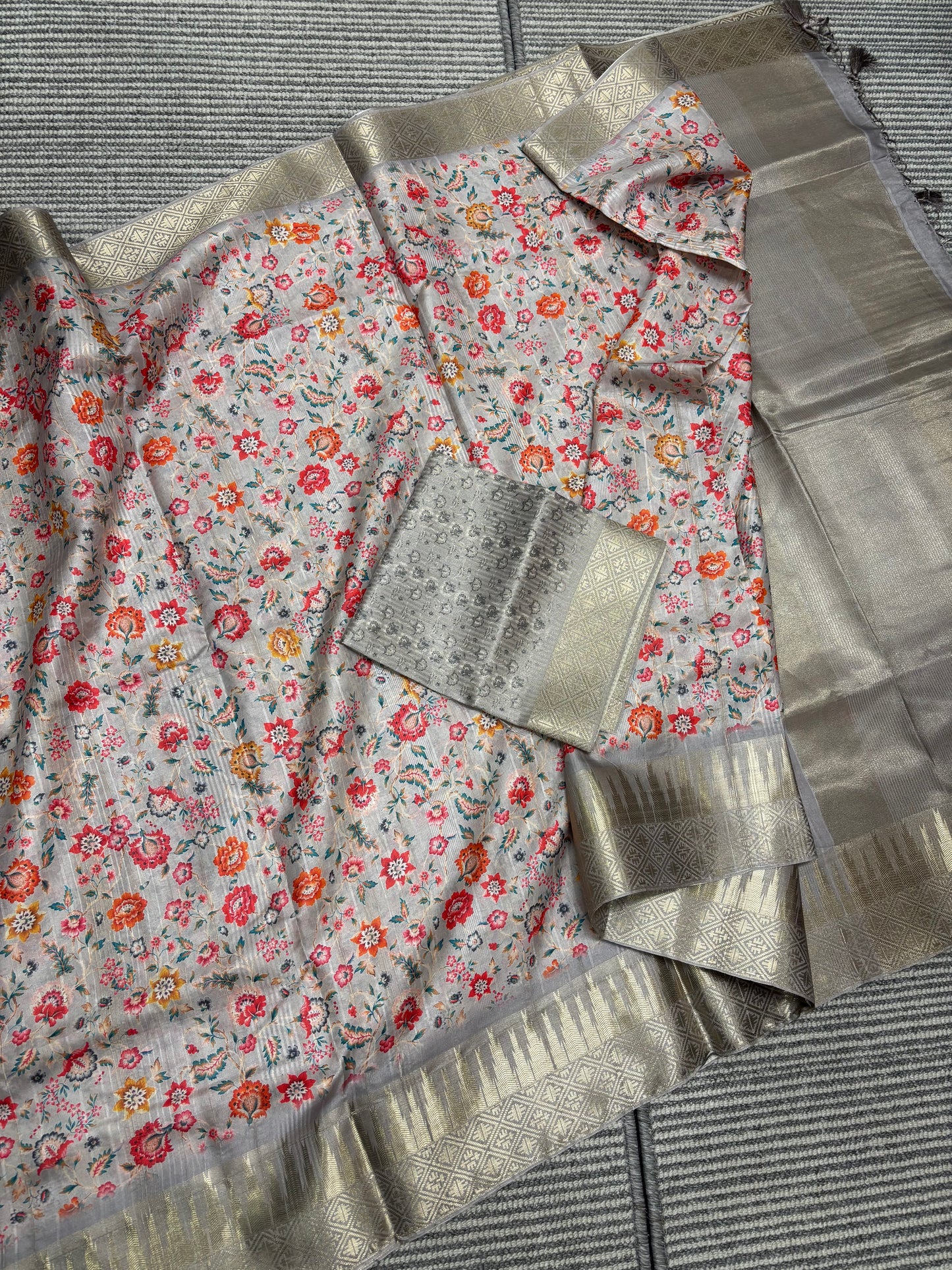 Elegant Light Grey Banarasi Tussar Saree Featuring Floral print and Golden Border
