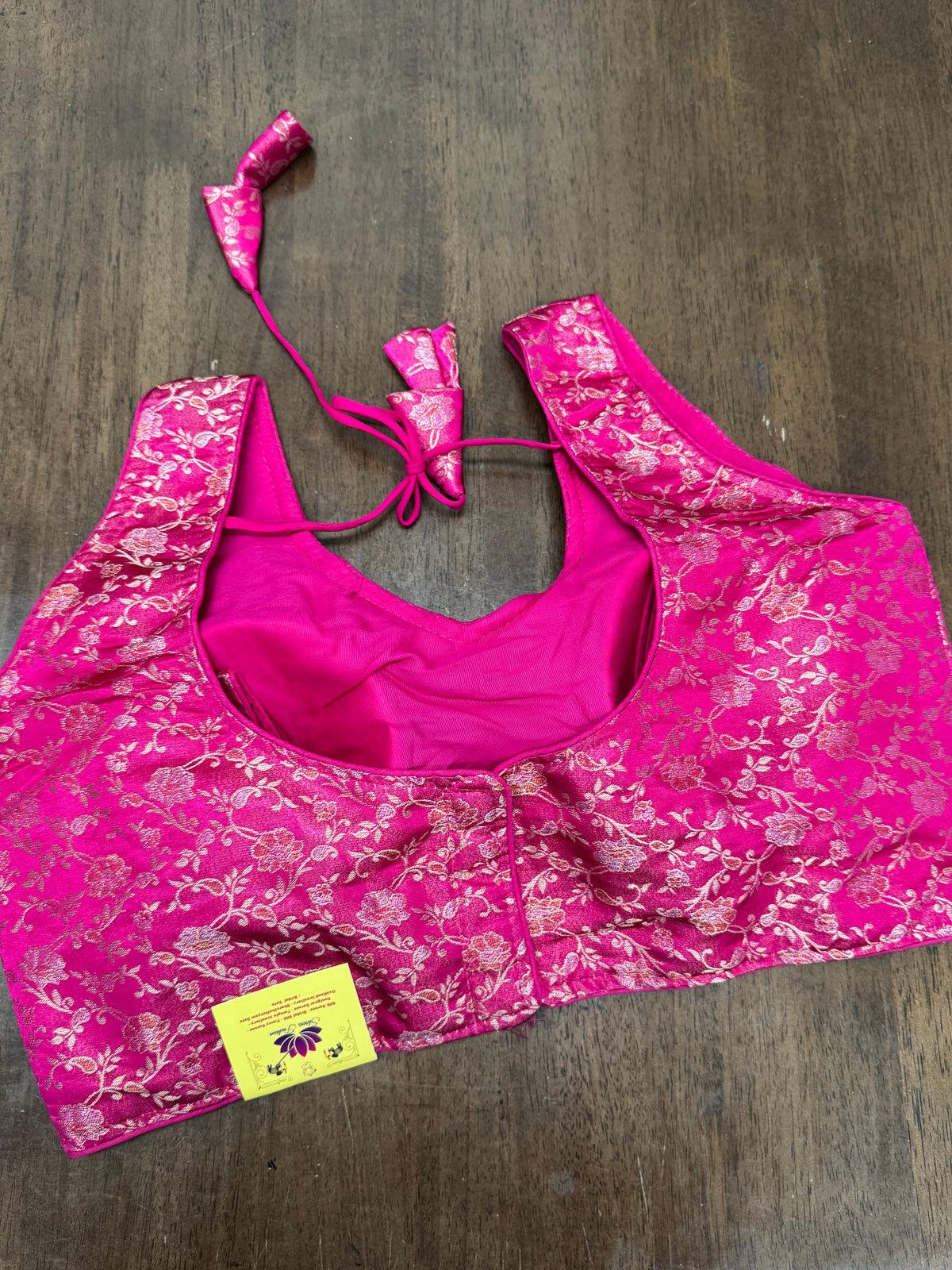 Festive Rani Pink Sleeveless Blouse with Gold Accents