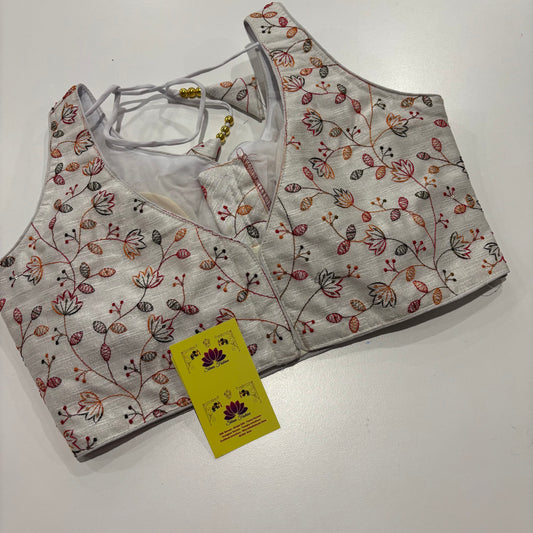 White Readymade Blouse with Embroidery Work & Attached Sleeve Fabric
