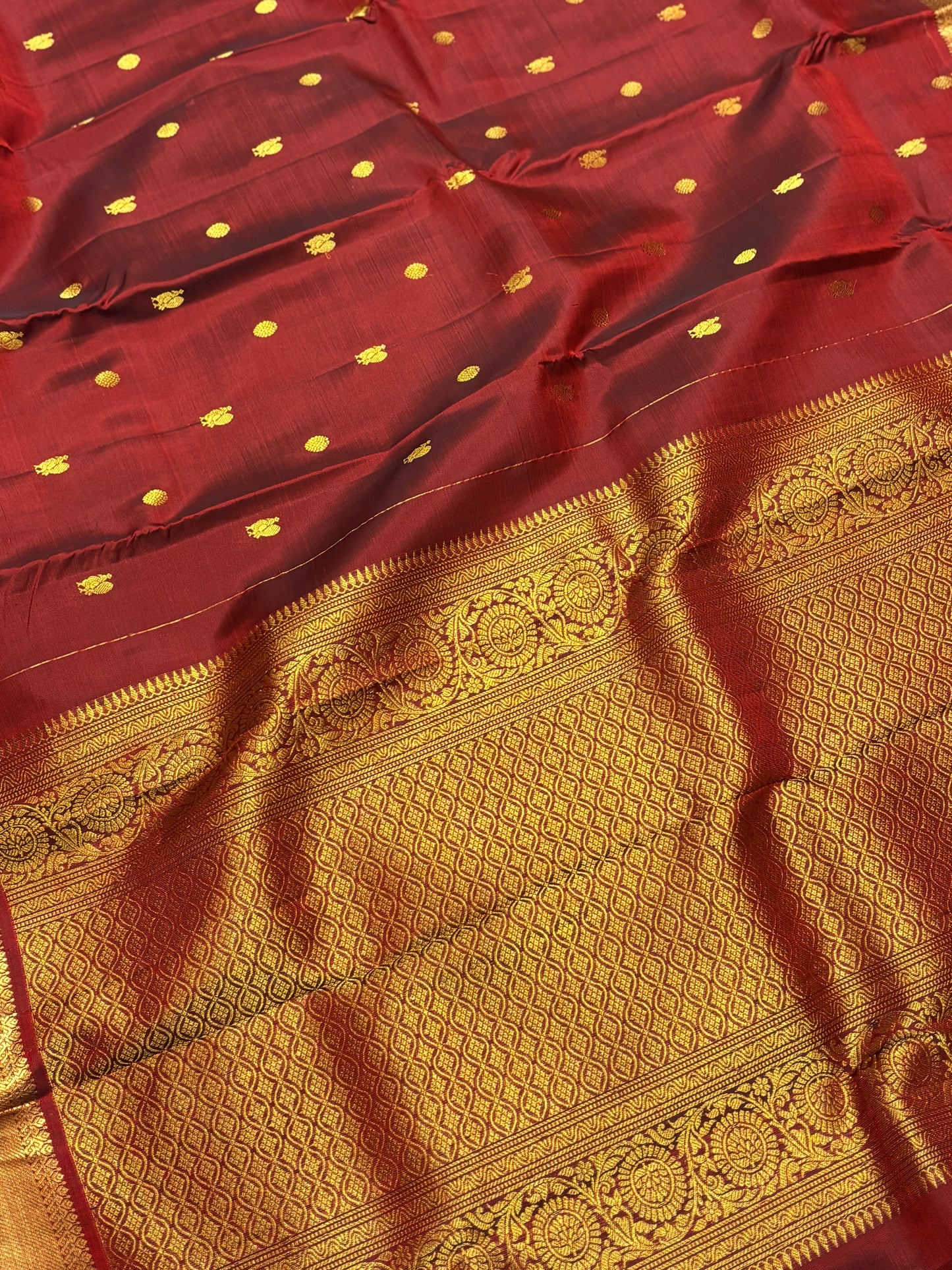 Elegant Maroon Pure Kanchipuram Silk Saree Featuring Traditional Peacock Buttas & Classic Zari Detailing