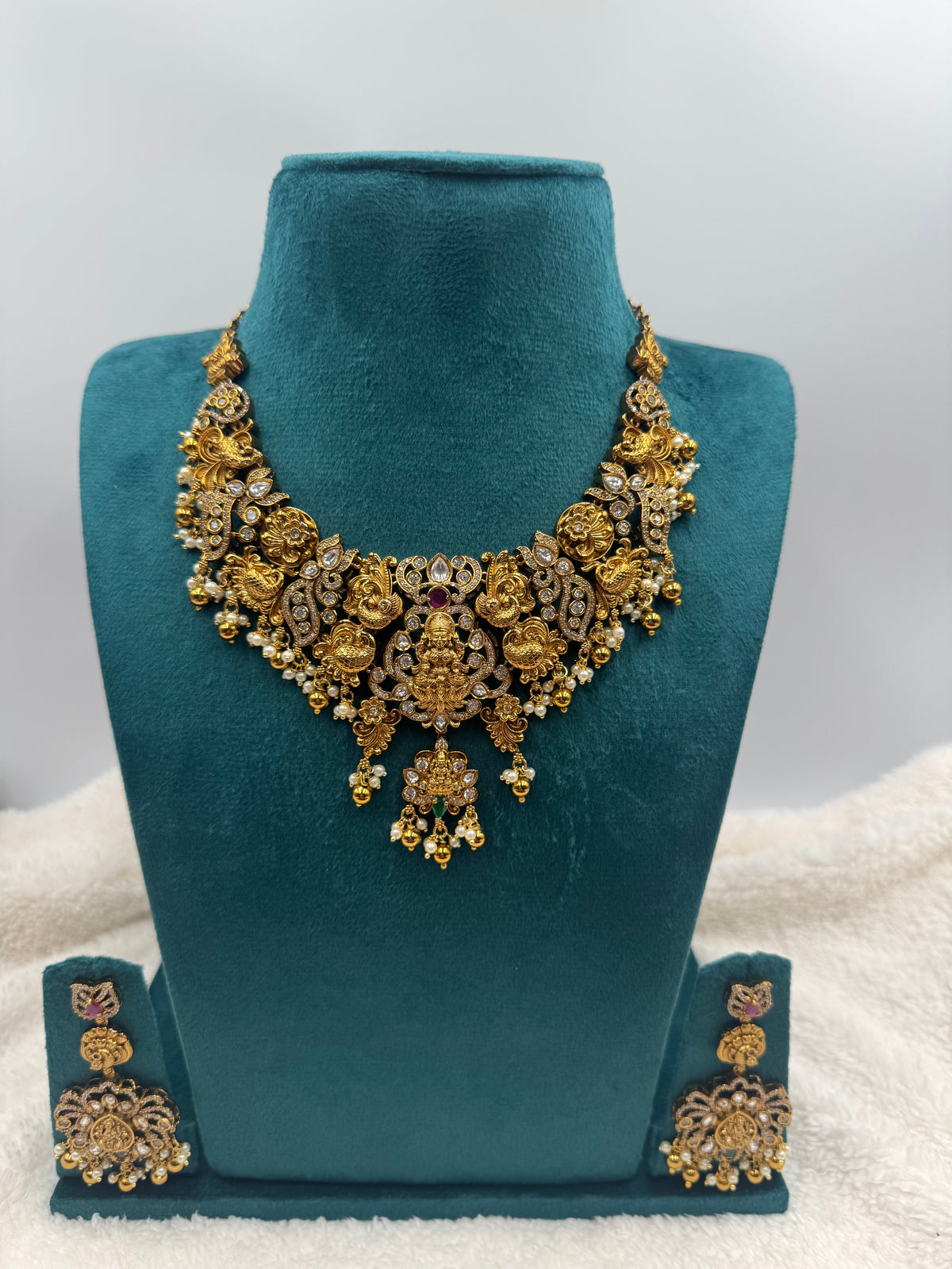 Premium Gold Finish Temple Design Necklace Set with Pearl & Stone Detailing