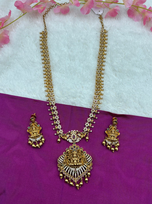Elegant Temple Long Haram Set with Lakshmi Design & Sparkling White Stones