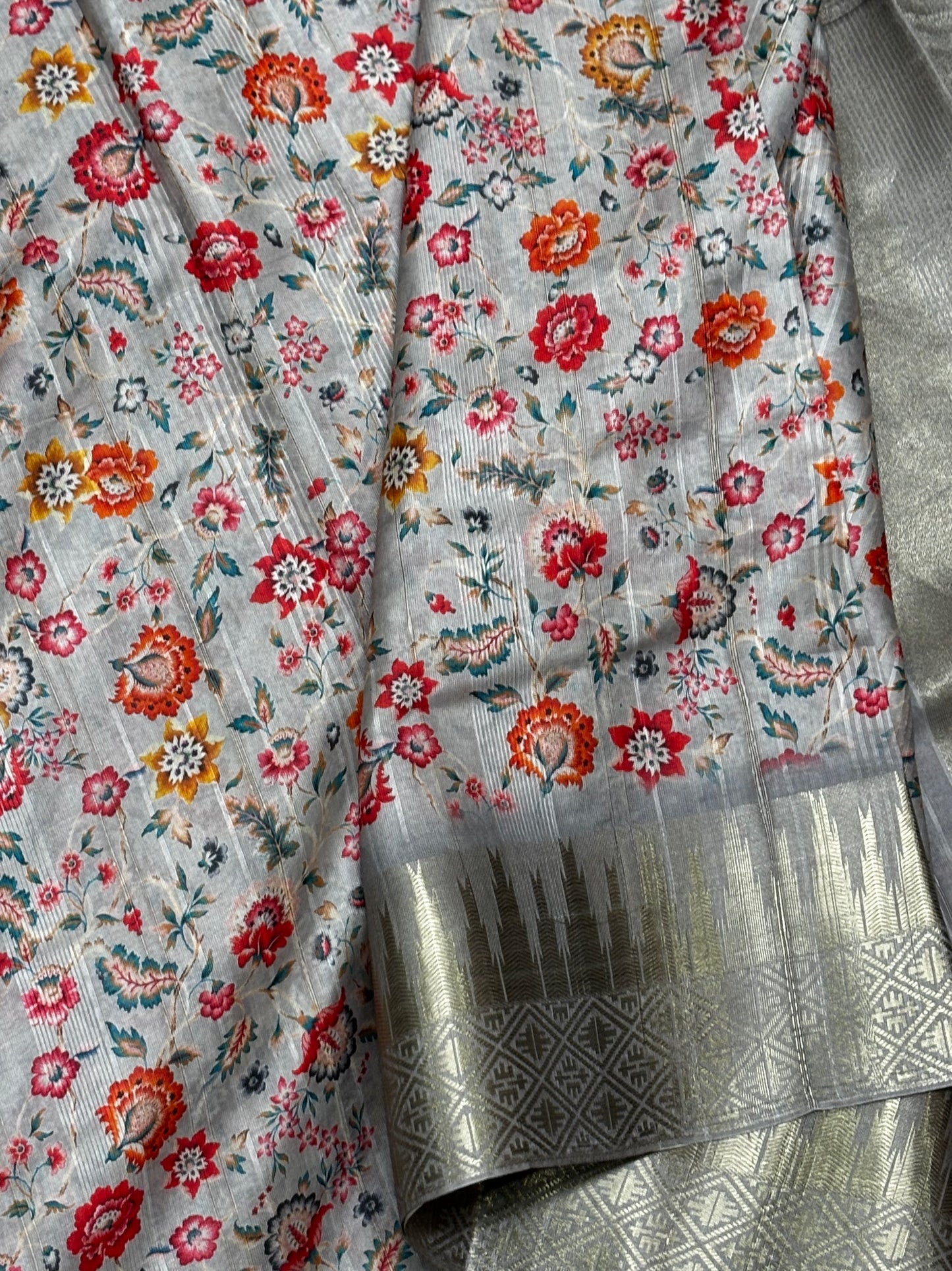 Elegant Light Grey Banarasi Tussar Saree Featuring Floral print and Golden Border