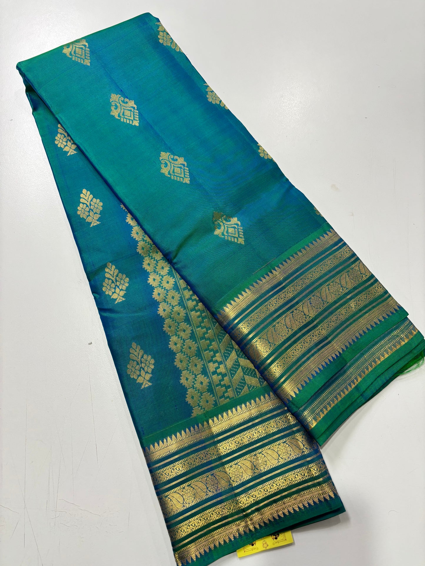 Handwoven Pure Kanchipuram Silk Saree in Regal Peacock Blue with Elegant Classic Accents
