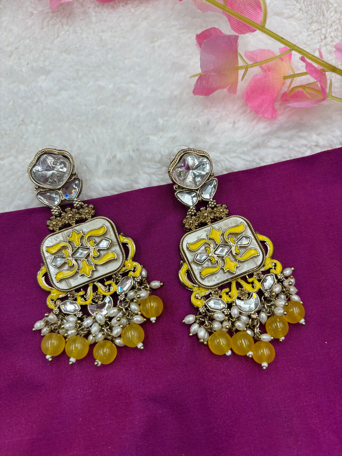 Elegant Kundan Earrings with Yellow Meenakari and Pearl Accents