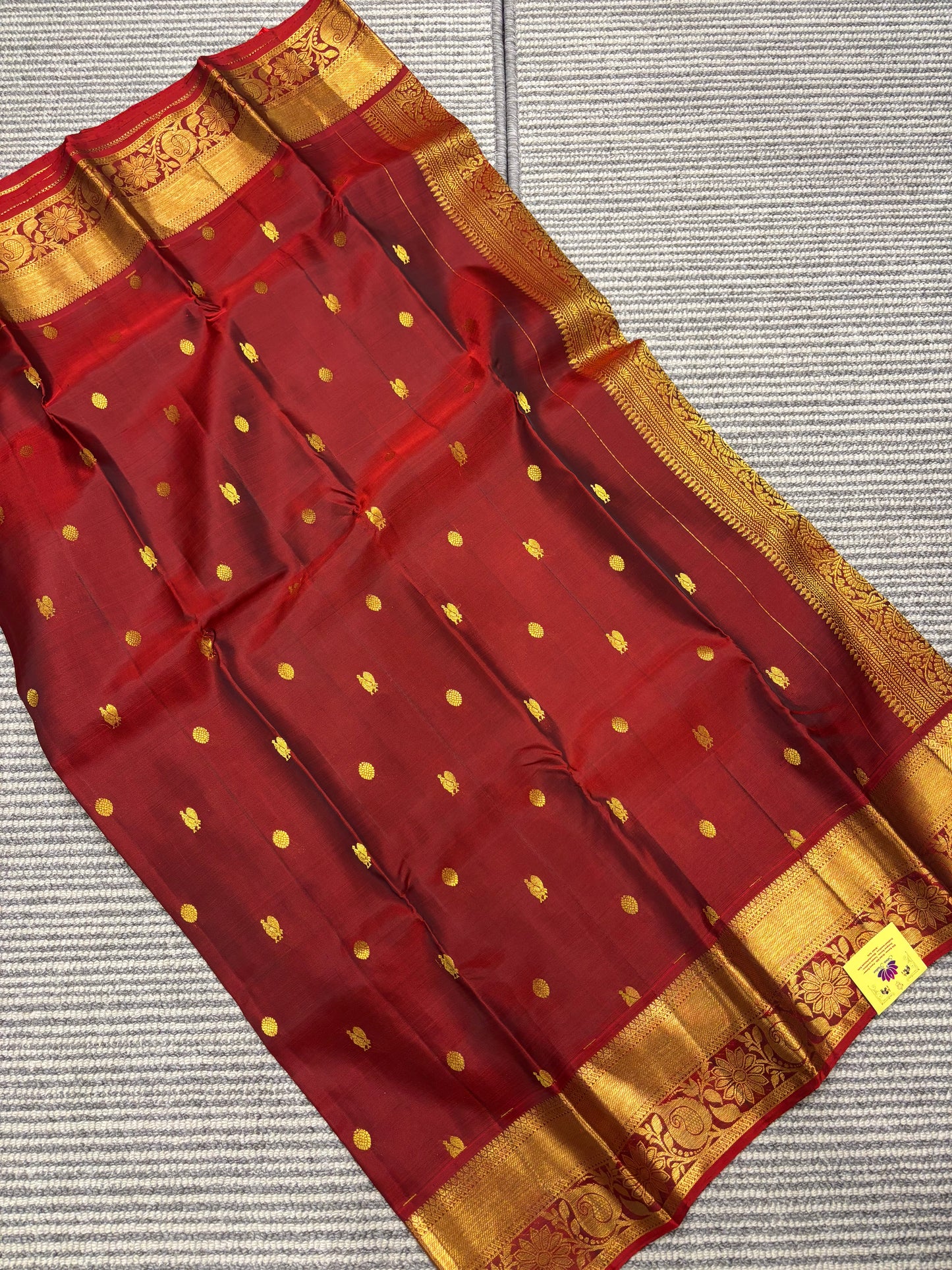 Elegant Maroon Pure Kanchipuram Silk Saree Featuring Traditional Peacock Buttas & Classic Zari Detailing
