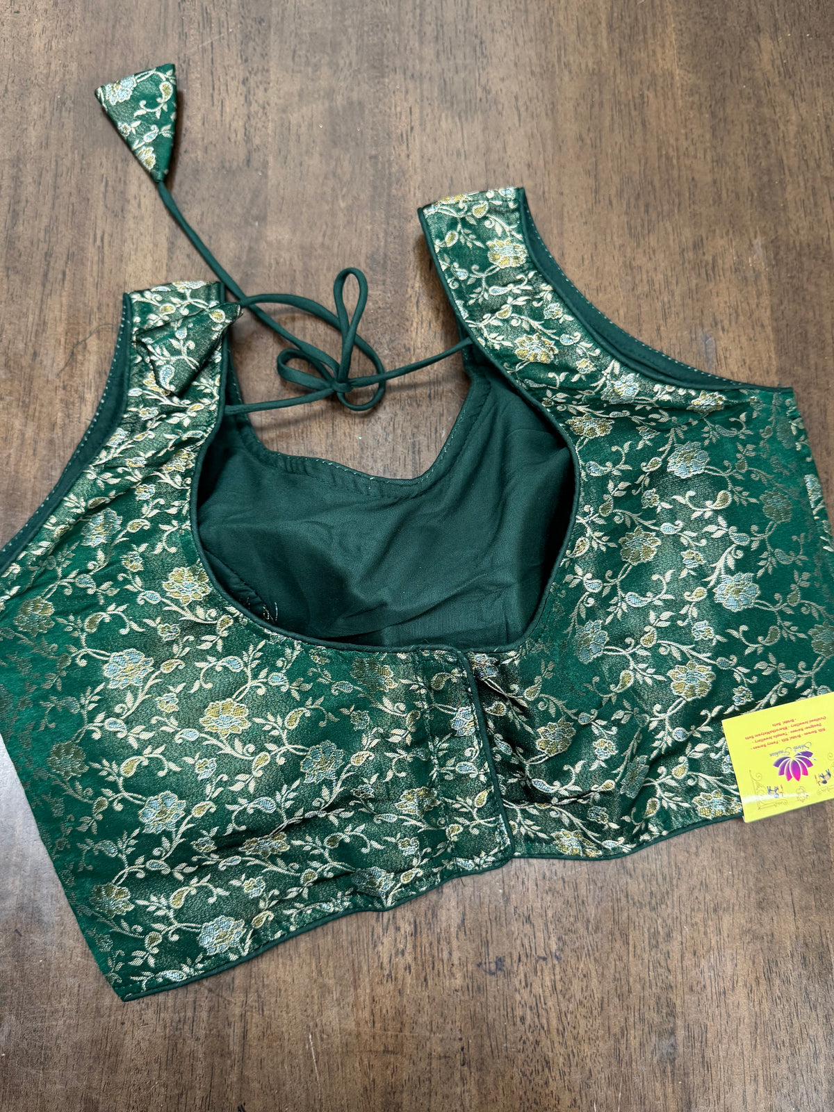 Elegant Bottle Green Brocade Blouse Featuring Gold Thread Motifs