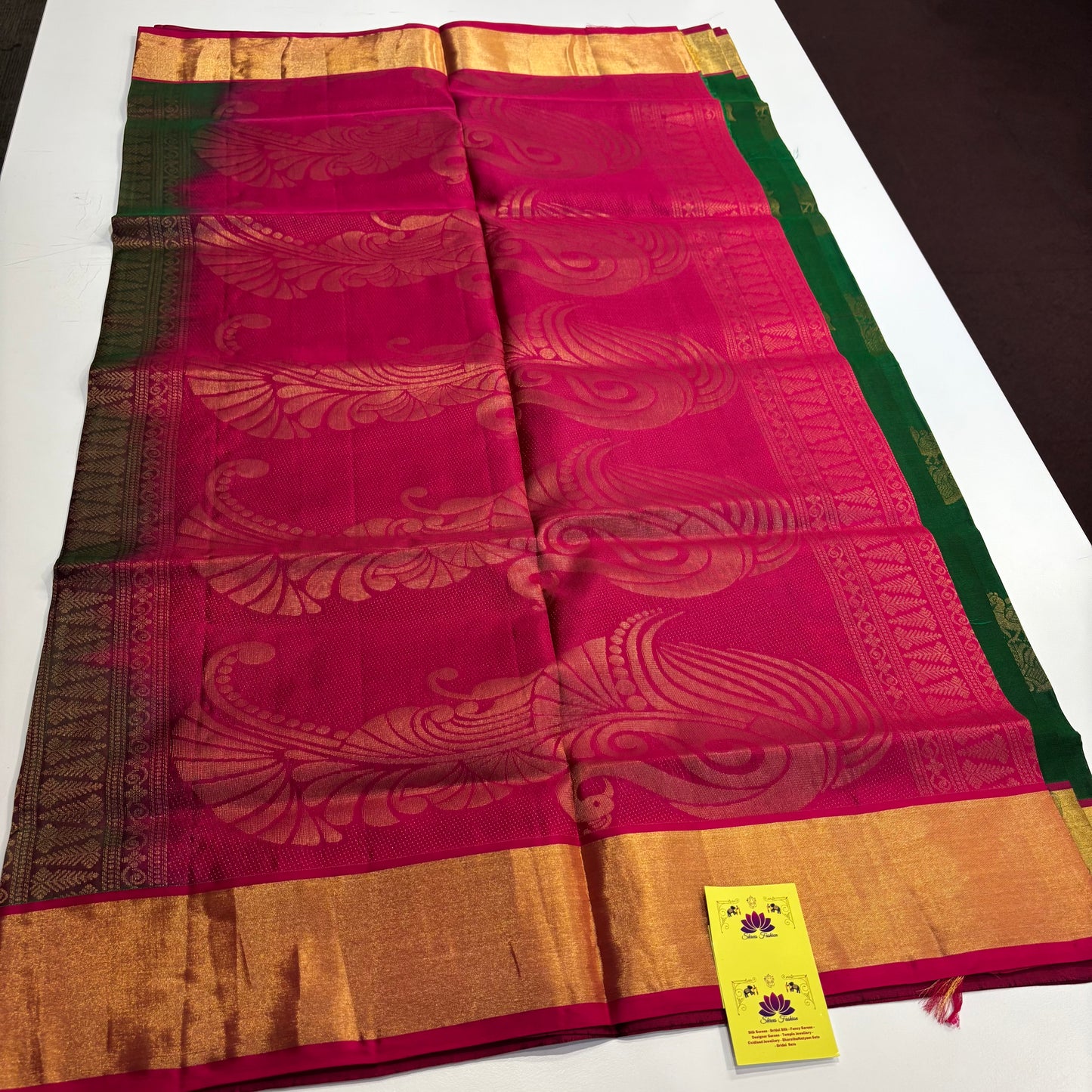Heritage Elegance – Pure Kanchipuram Saree in Bottle Green with Magenta Zari