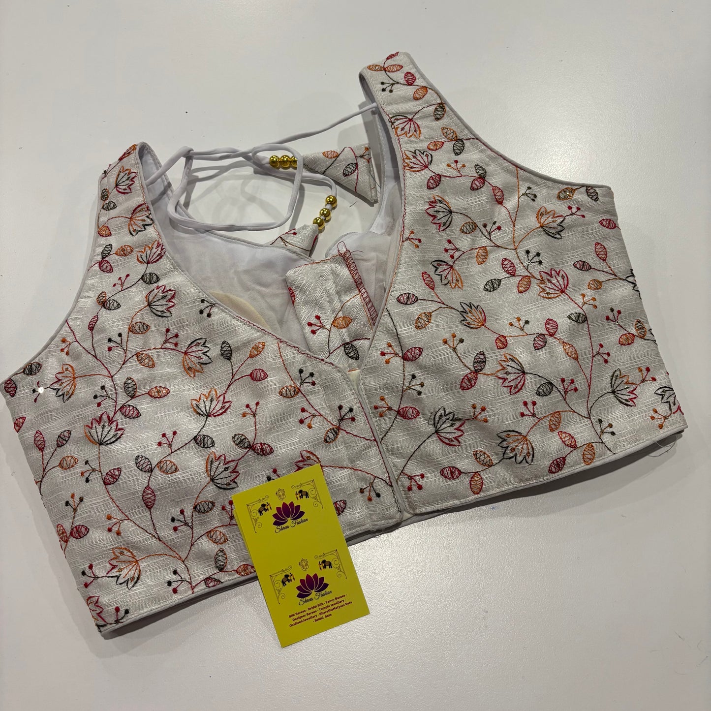 White Readymade Blouse with Embroidery Work & Attached Sleeve Fabric