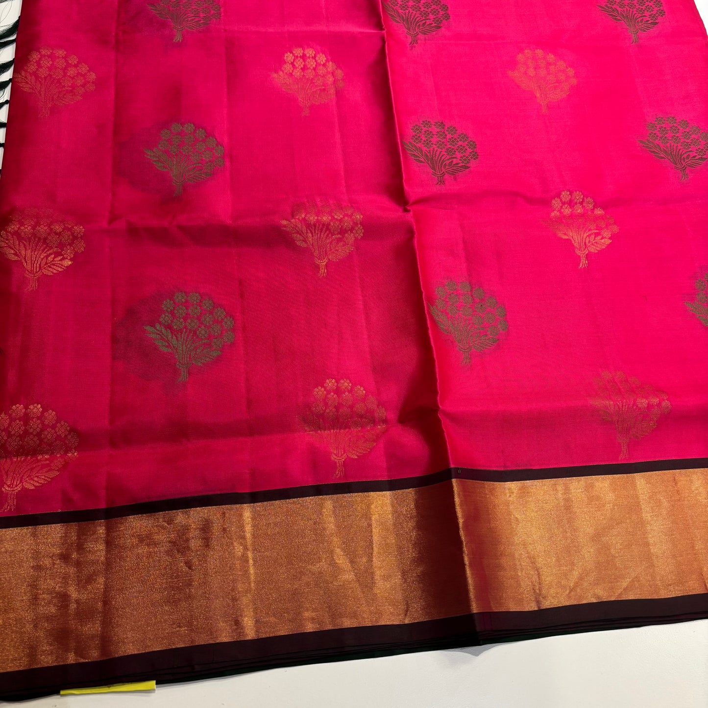 Handwoven Kanchipuram Silk Saree in Rani Pink and Bottle Green with Gold Zari Work