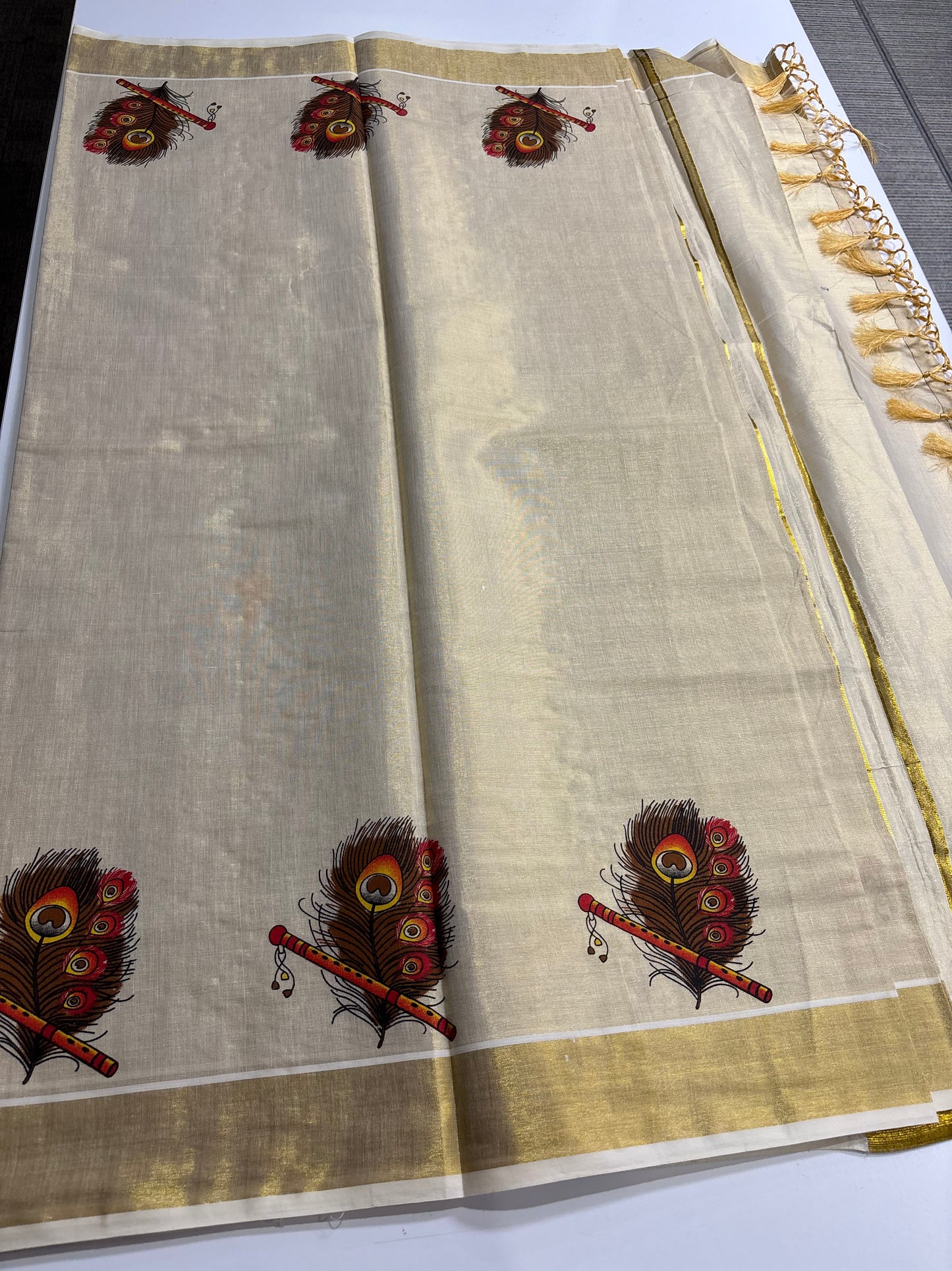Kerala Kasavu tissue silk saree with peacock feather and flute motifs – view 4