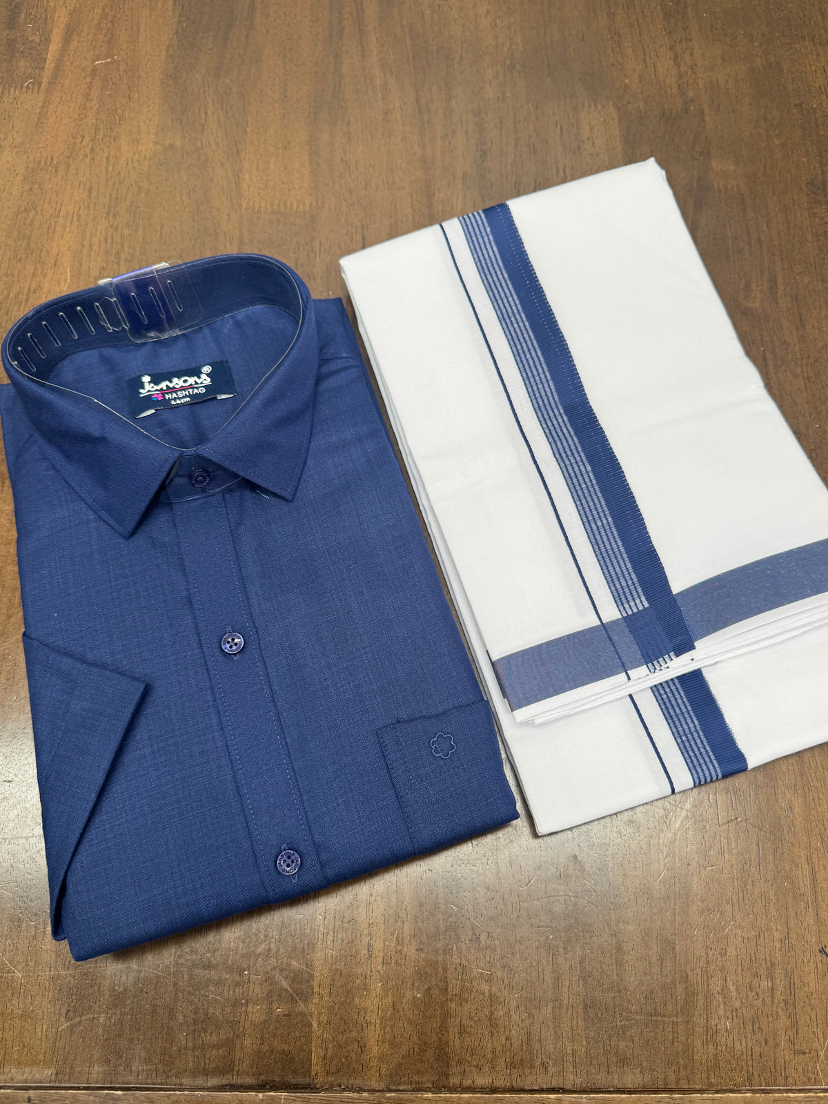 Traditional Blue Half‑Sleeve Shirt Matched with White Veshti and Premium Border