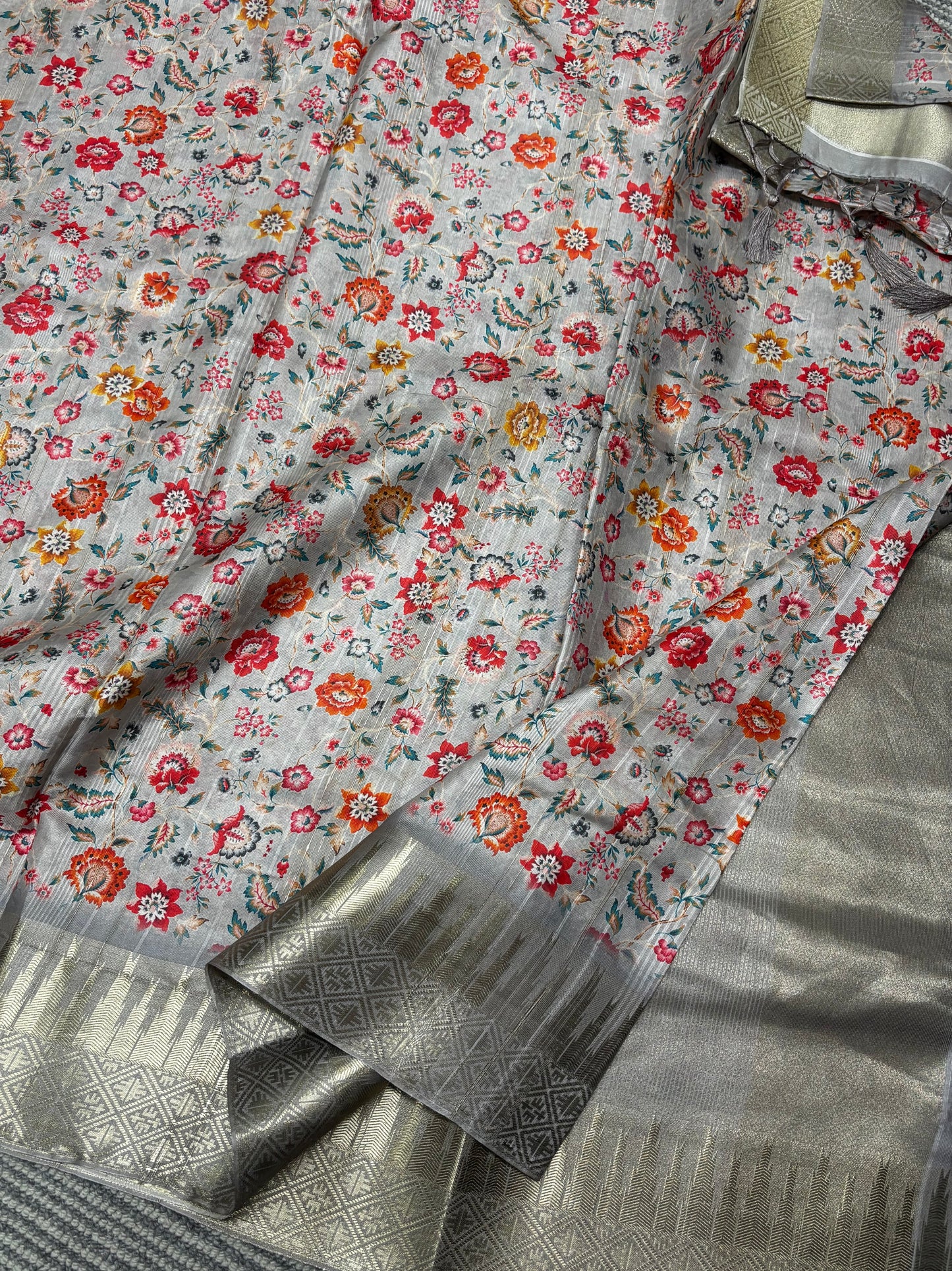 Elegant Light Grey Banarasi Tussar Saree Featuring Floral print and Golden Border