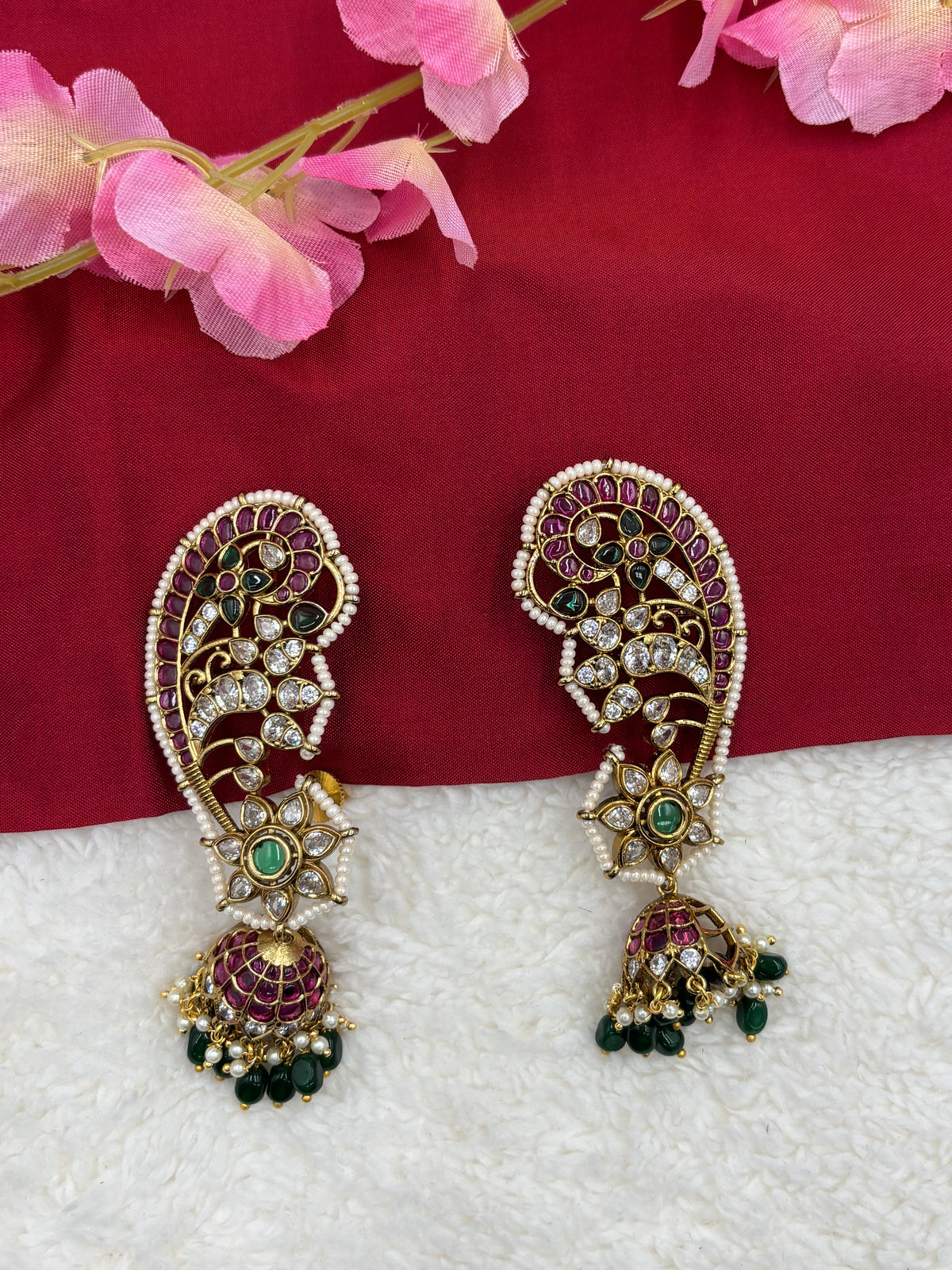Peacock‑Style Jhumka Earcuff with Ruby, Green Stones & Pearl Detailing – Antique Gold Finish