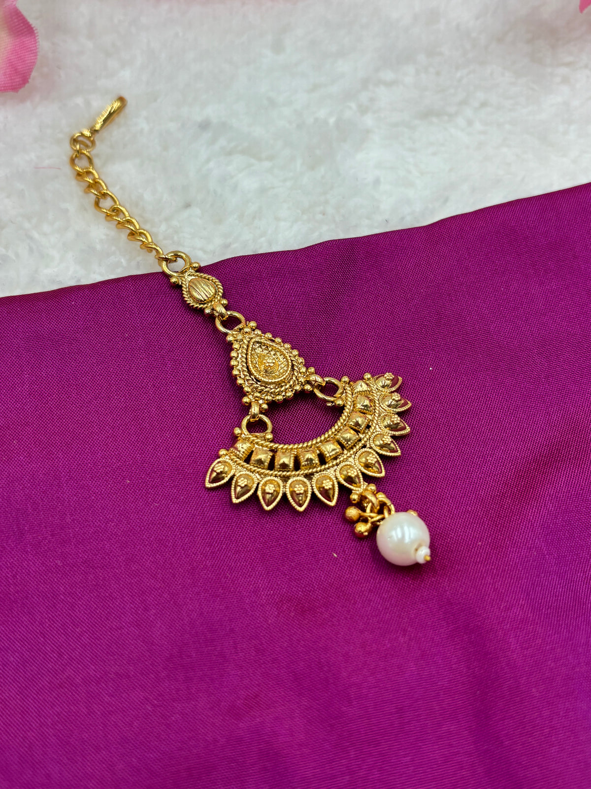 Elegant Matte Finish Tikka – Pearl Drop & Gold Chain Detailing