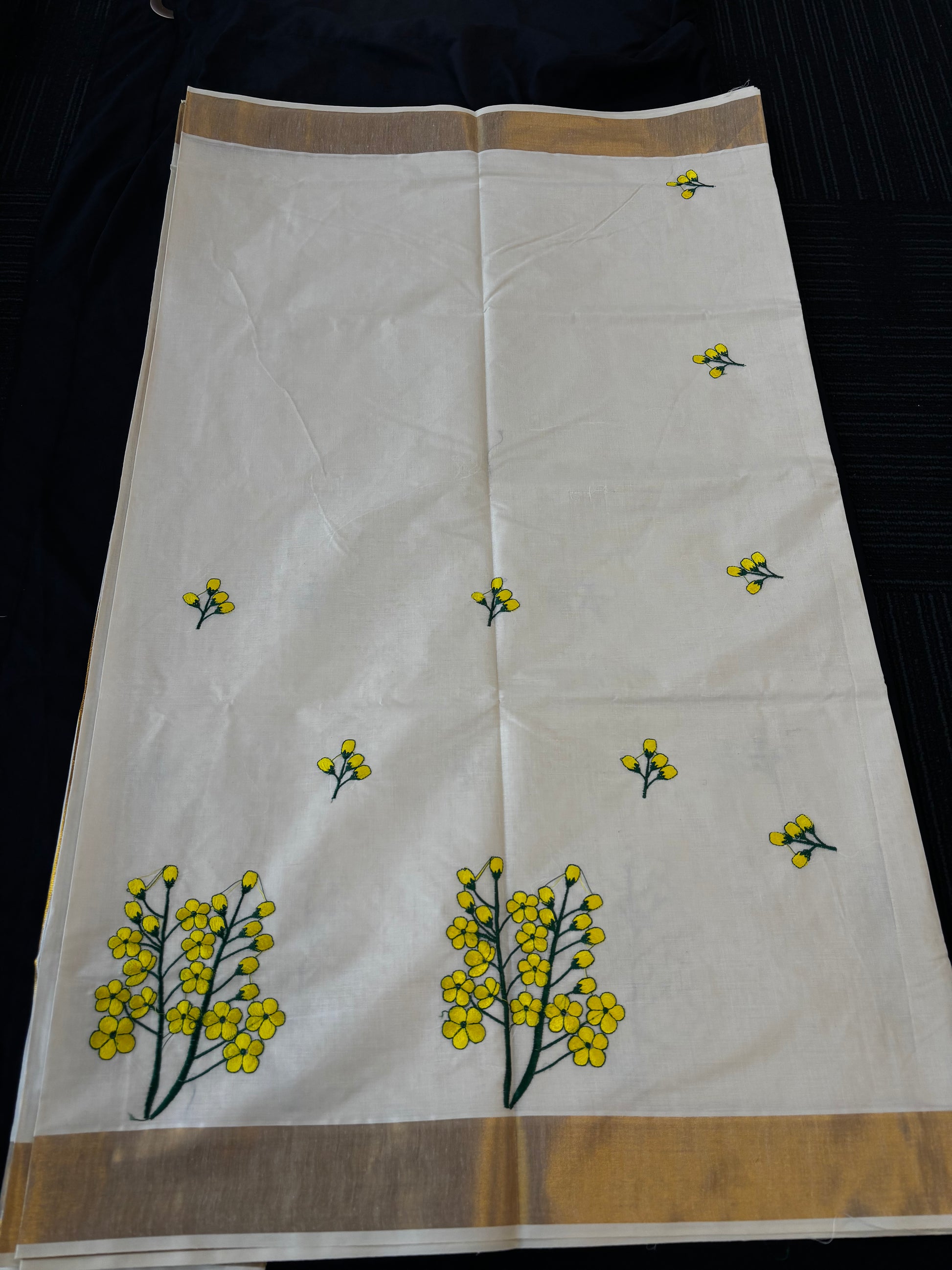 Kerala Kasavu saree with yellow floral embroidery and gold border – view 7
