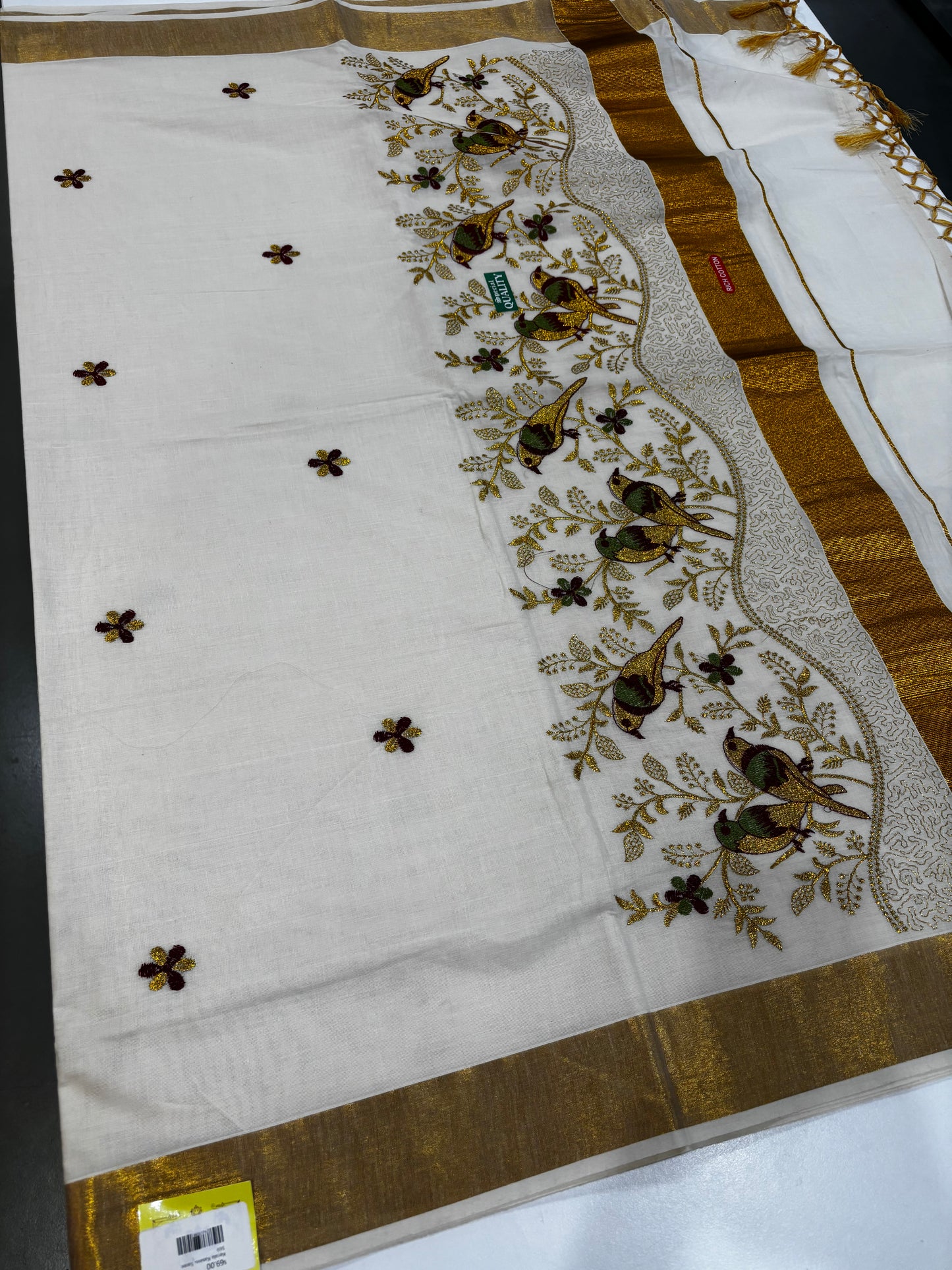 Kerala Kasavu saree with bird embroidery and gold zari border