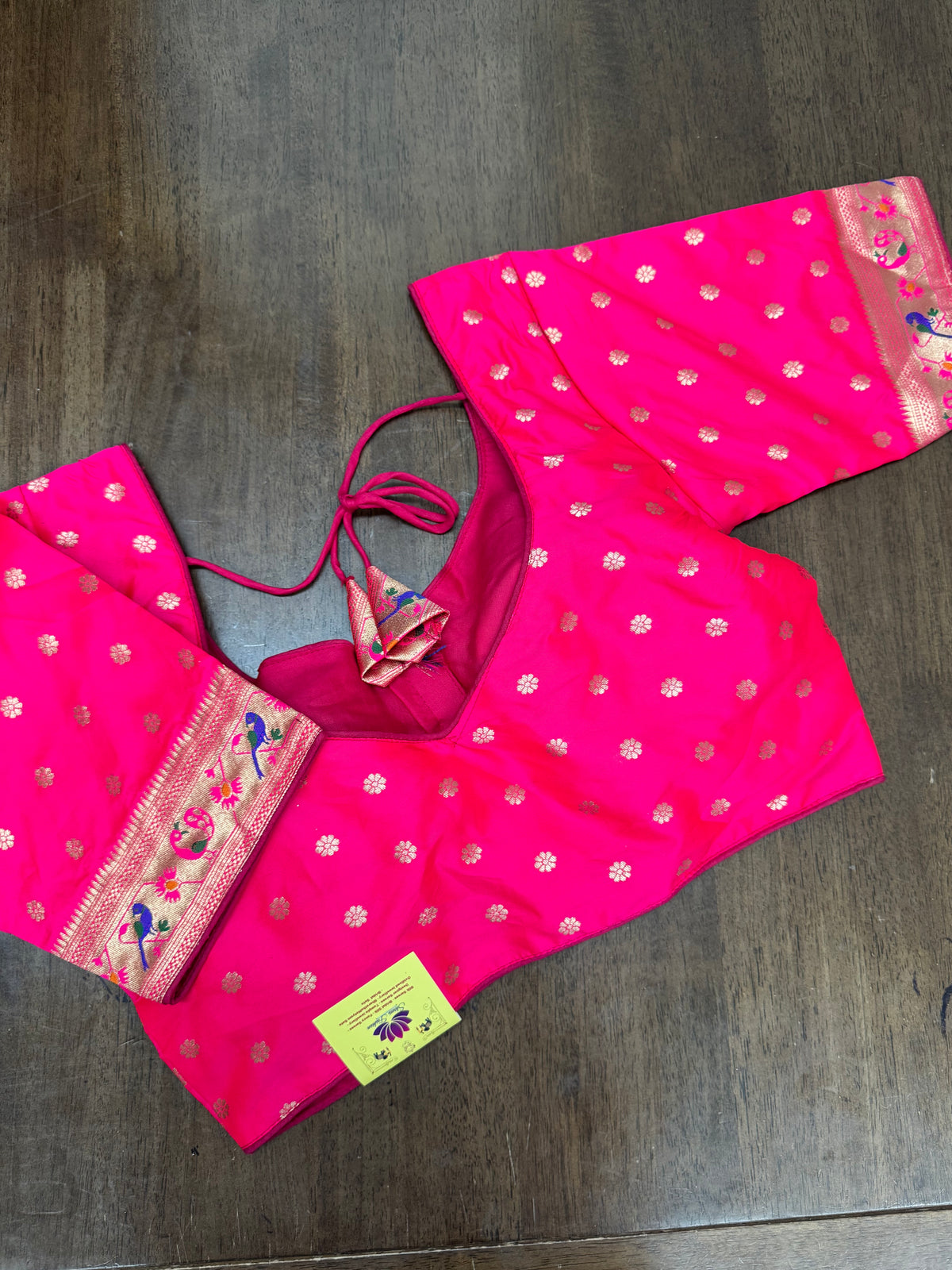 Elegant Pink Blouse Featuring Gold Motifs & Paithani Sleeve Design