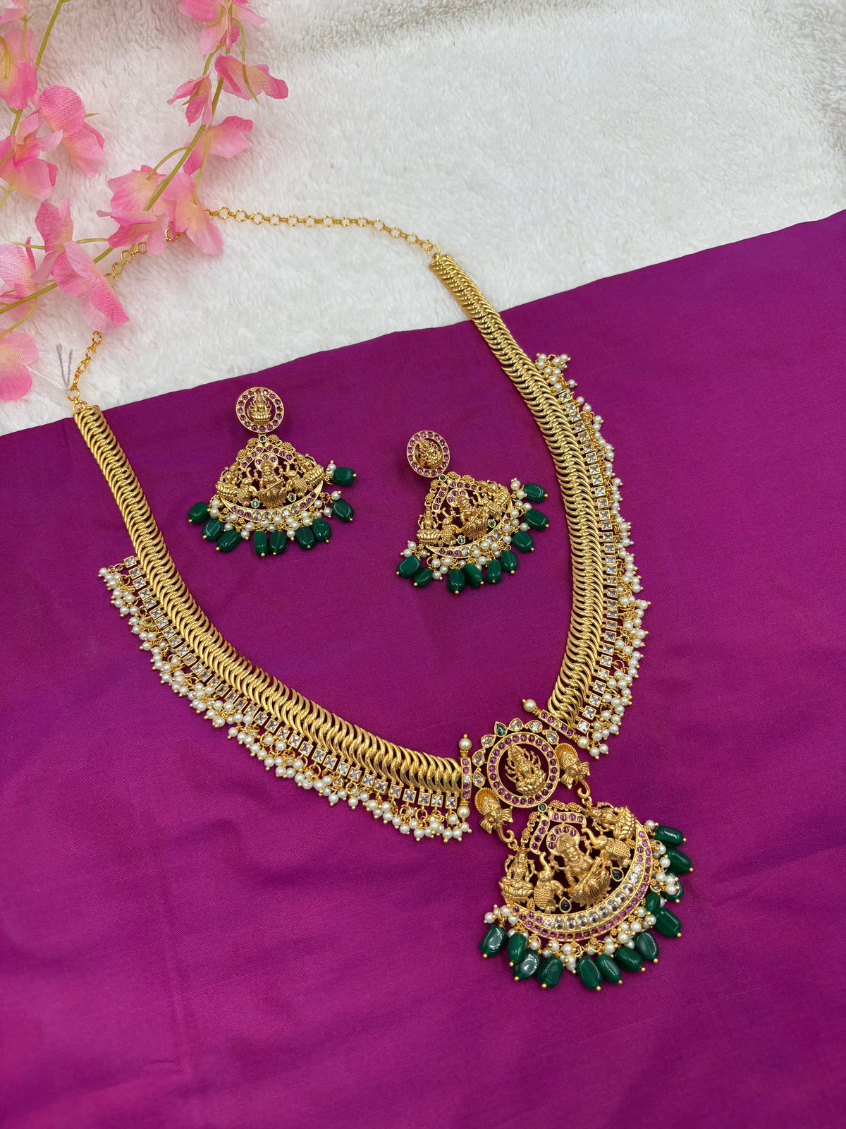 Premium Gold Finish Temple Long Haram Set with Green Stone Detailing & Matching Earrings