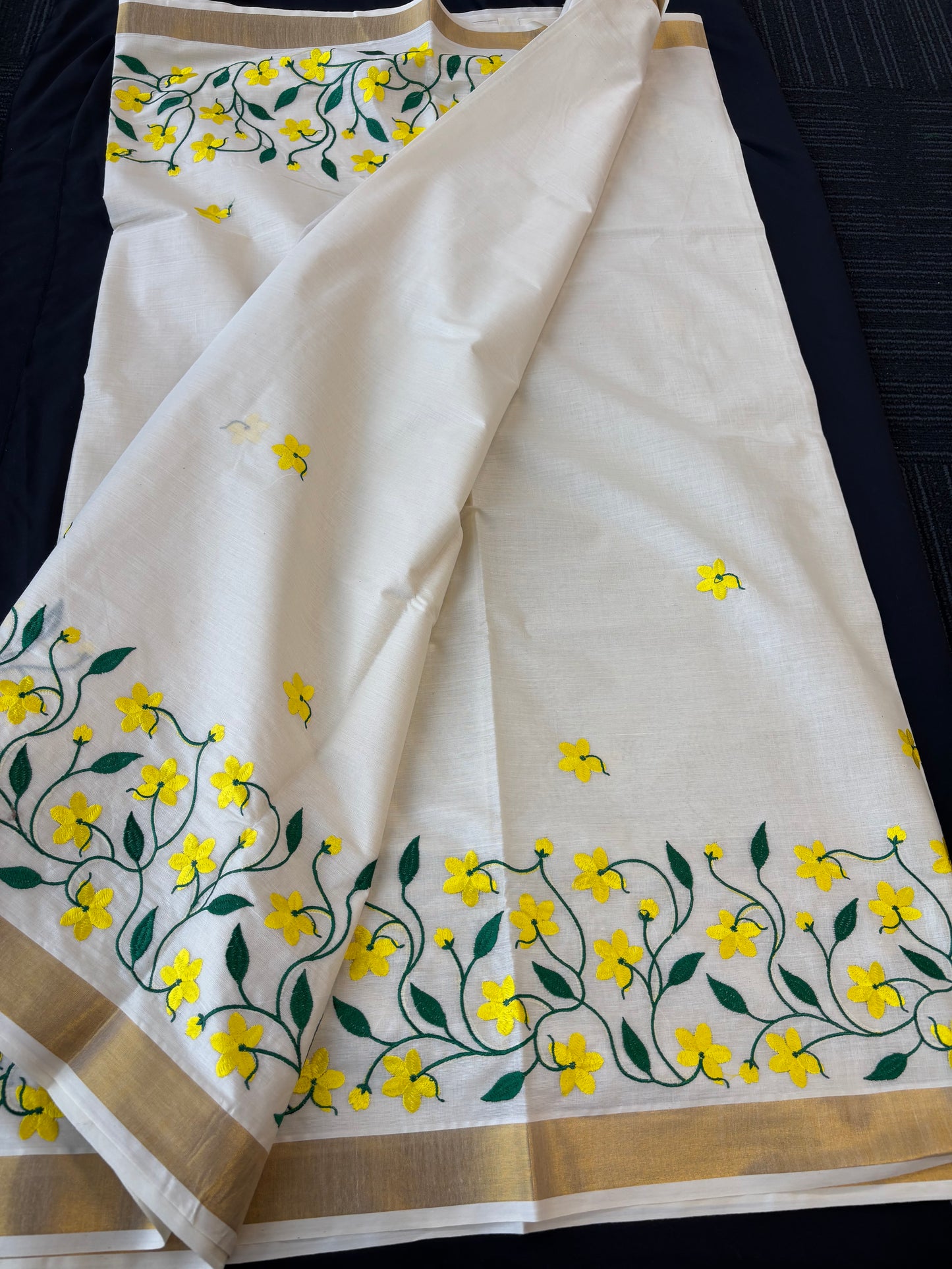 Kerala Kasavu saree with yellow floral and green vine embroidery – view 4