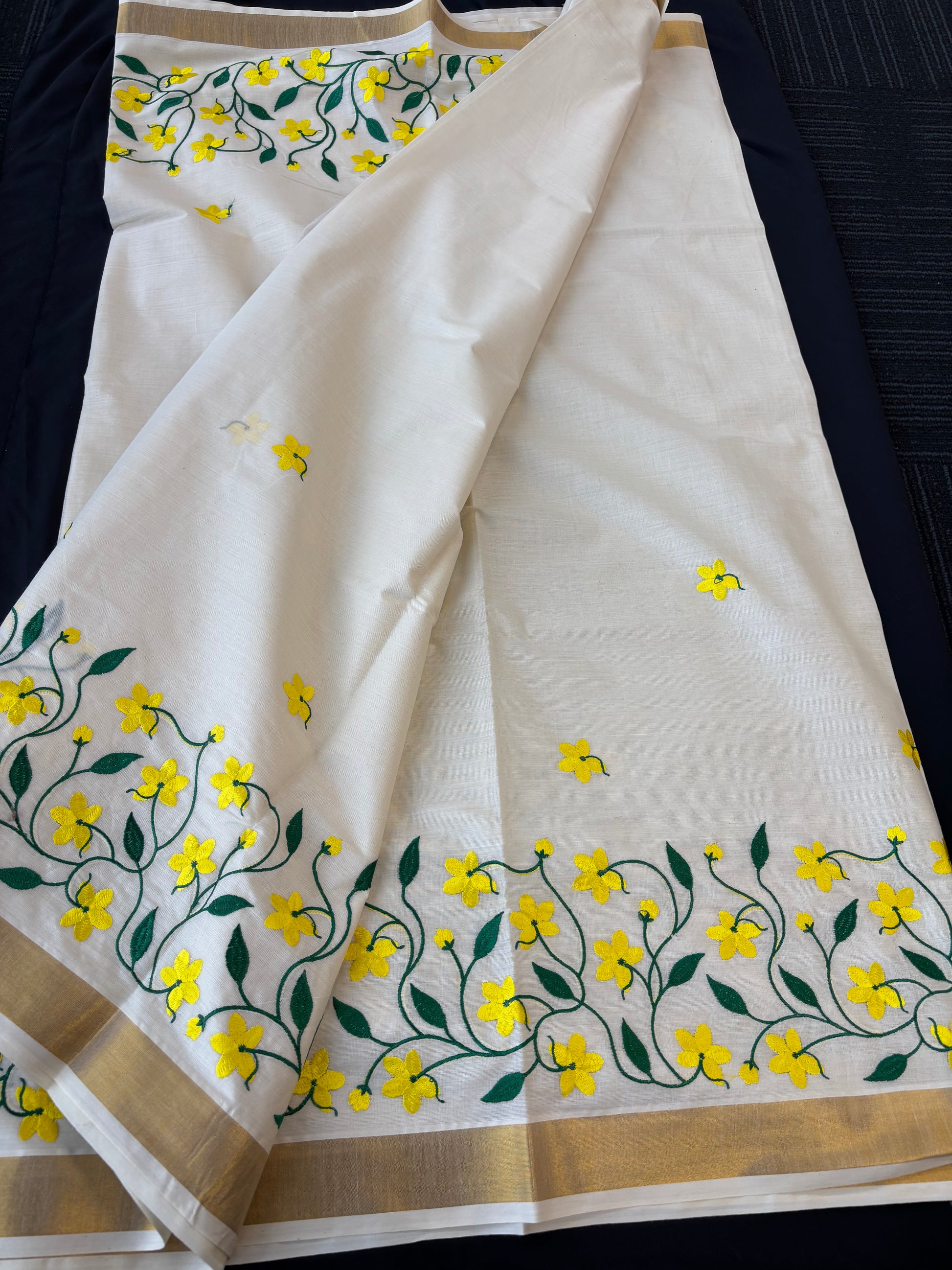 Kerala Kasavu saree with yellow floral and green vine embroidery – view 4